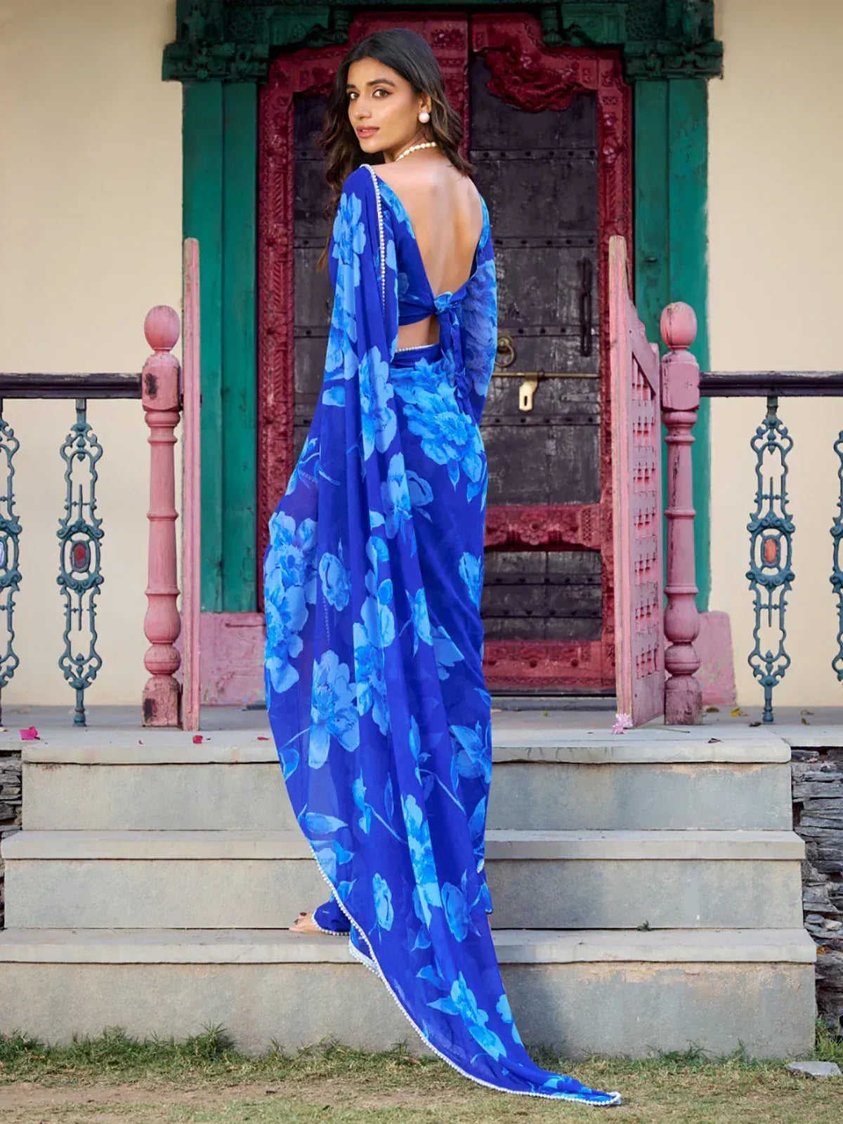 Blue floral saree with backless blouse, elegant ethnic wear for women