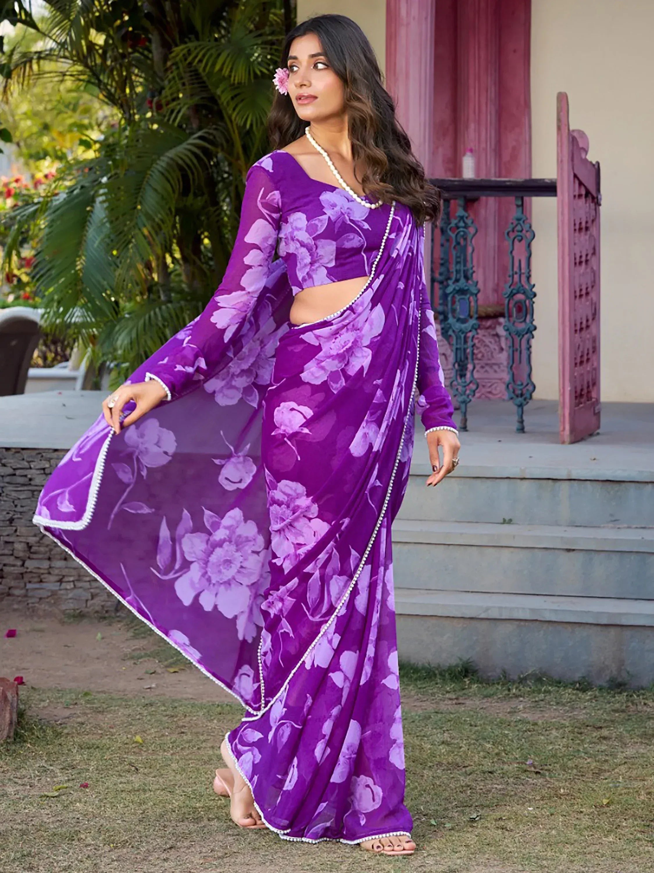 Purple floral saree with pearl border, perfect for ethnic occasions