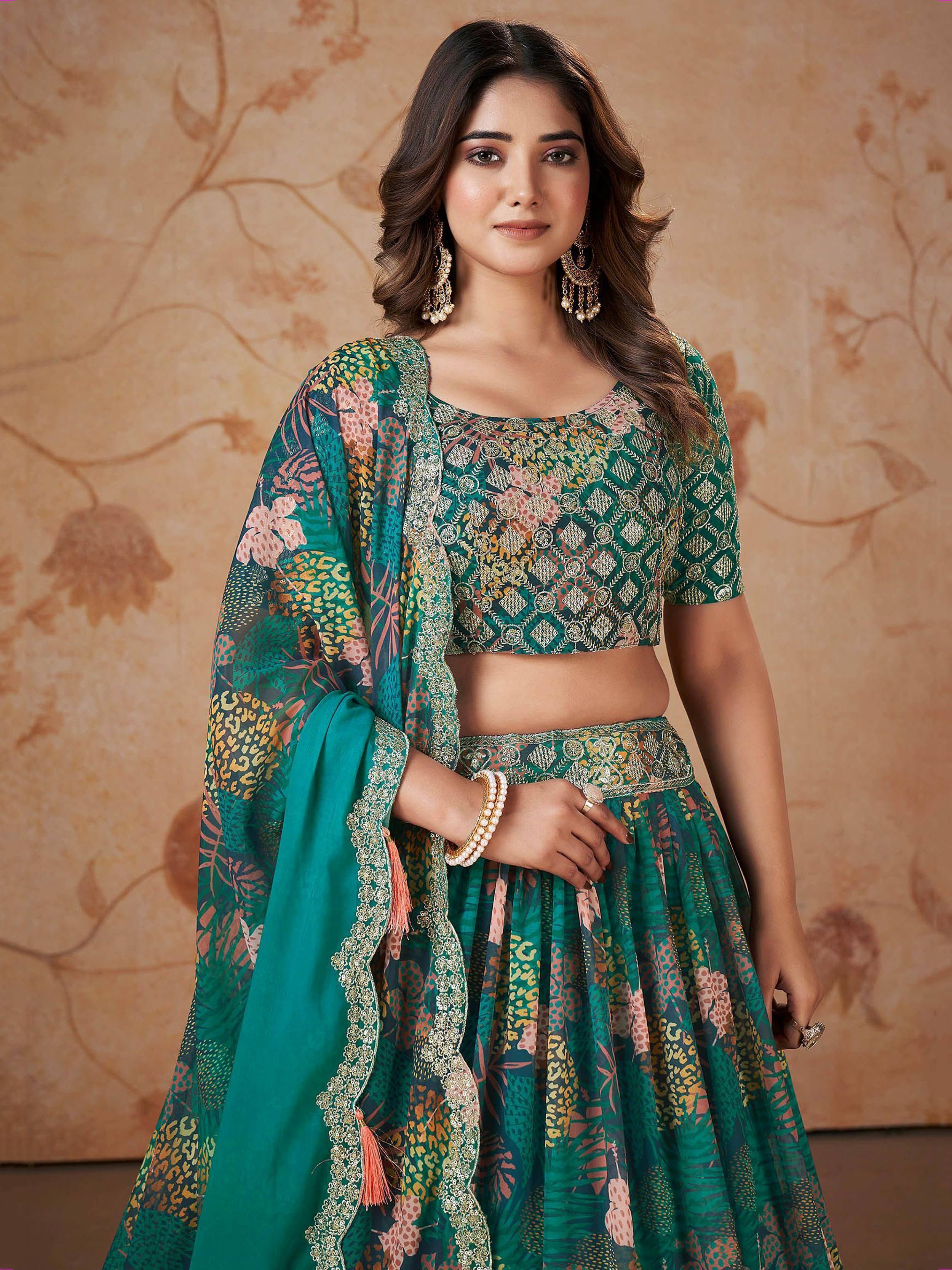Green printed lehenga choli with floral and animal print, ethnic Indian wear for women