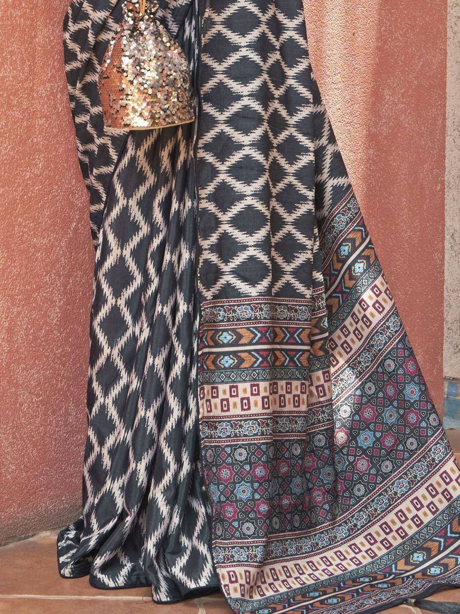 Black and cream ikat saree with sequin blouse and colorful border, ethnic Indian wear