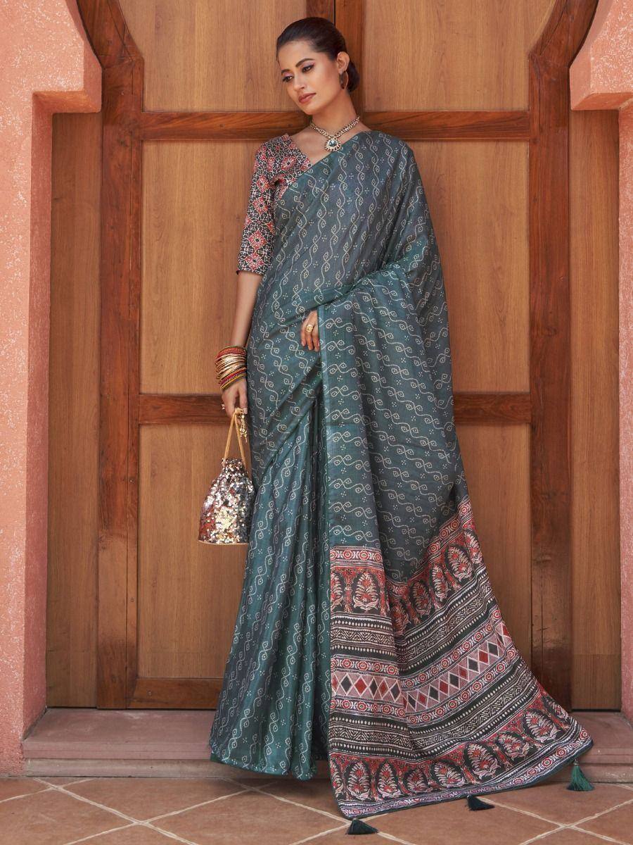 Teal printed saree with red border, ethnic wear for women, paired with blouse and jewelry