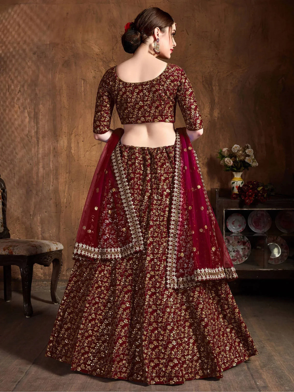 Maroon designer lehenga choli with gold floral embroidery and net dupatta, ethnic Indian wear