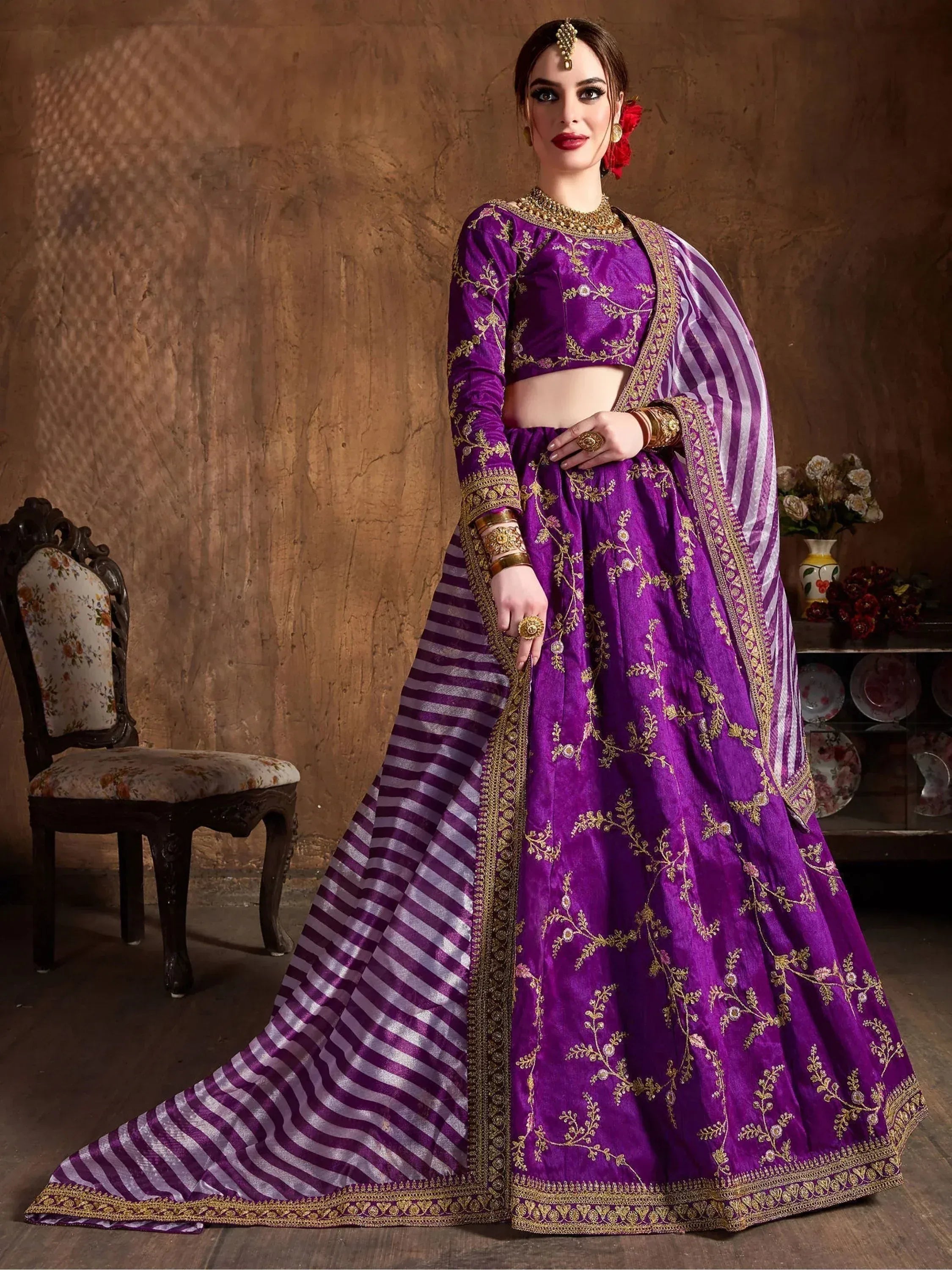 Purple designer lehenga choli with gold embroidery and striped dupatta for Indian ethnic wear