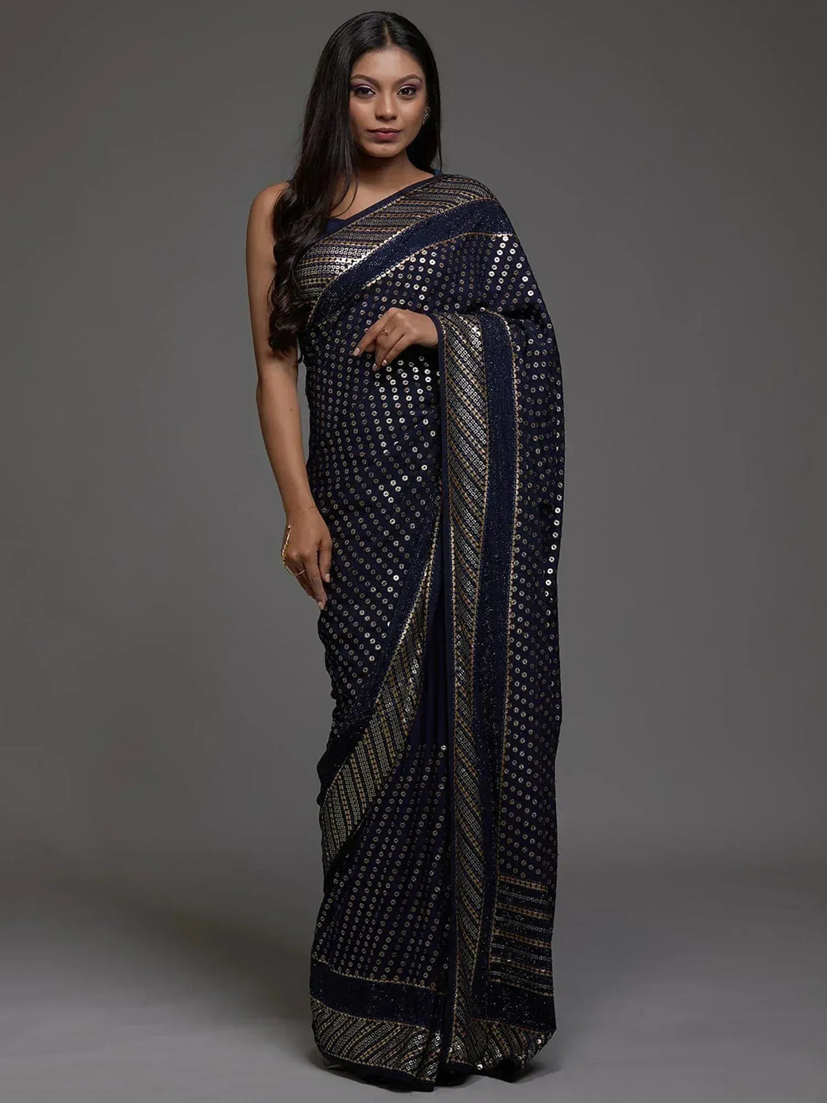 Navy blue saree with gold sequin work and border, elegant Indian ethnic wear for women