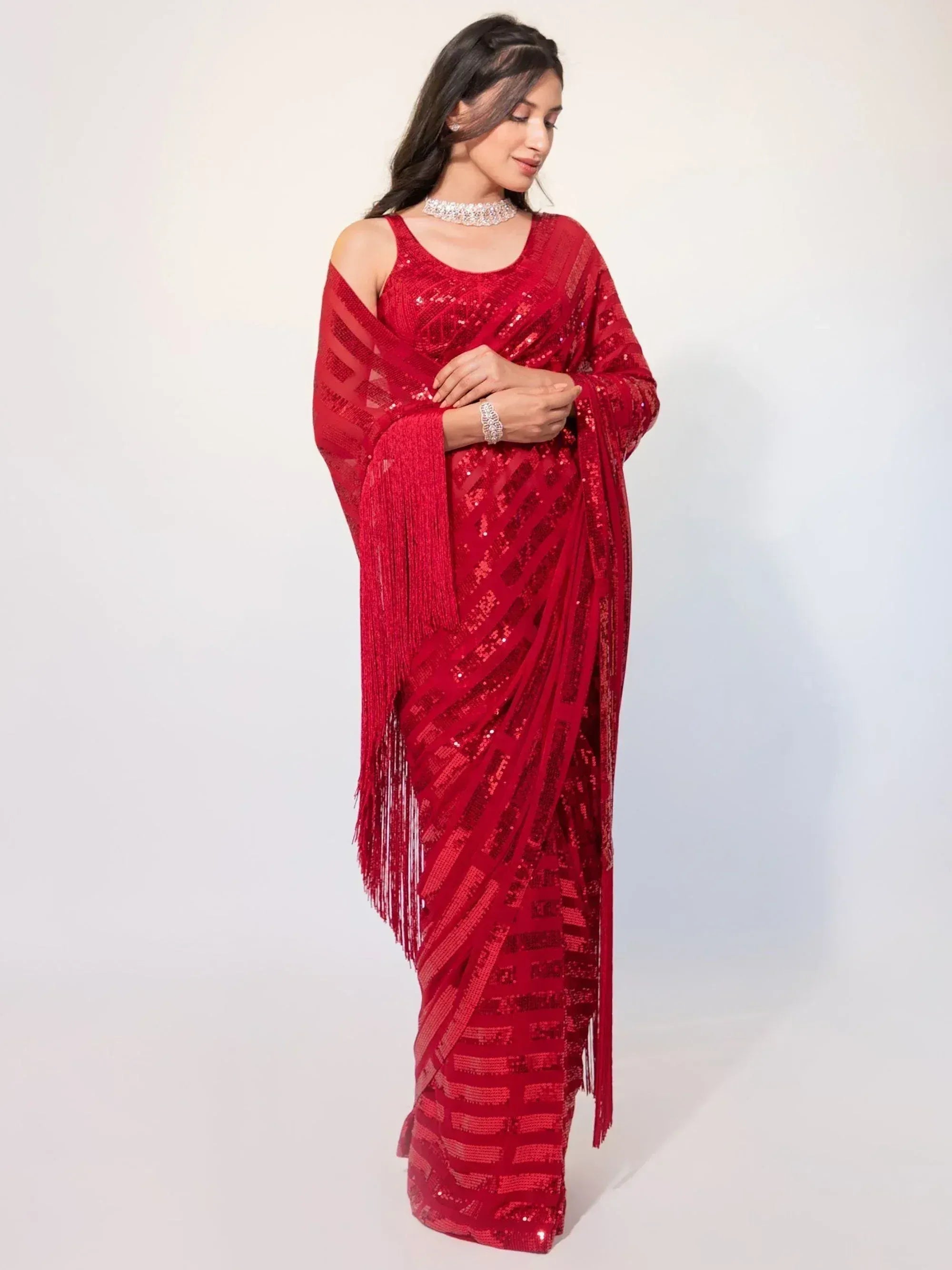 Red sequin saree with fringe detailing, perfect for Indian ethnic wear events and celebrations