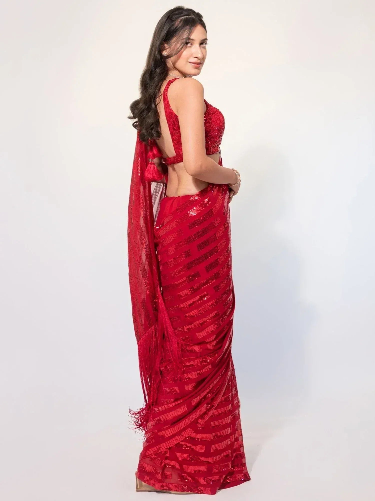Red sequin saree with backless blouse, ethnic Indian wear for women