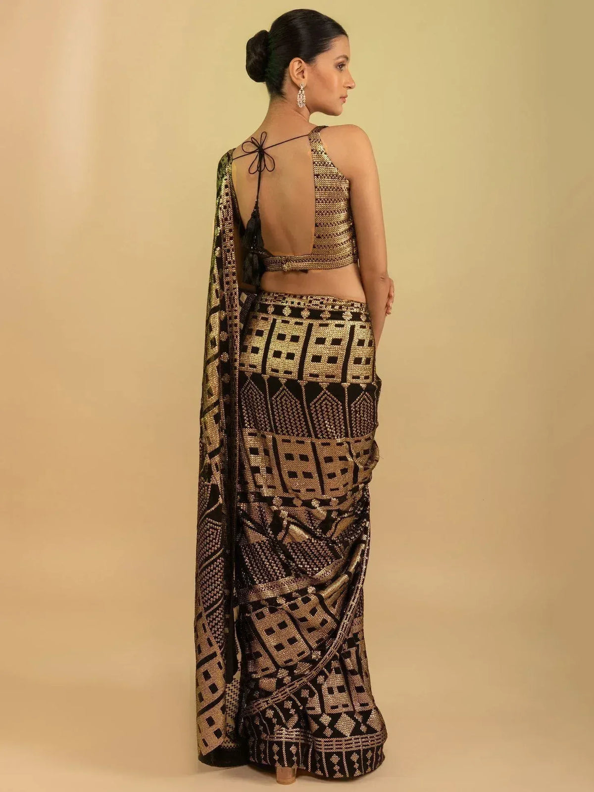 Black and gold geometric patterned saree with backless blouse, Indian ethnic wear