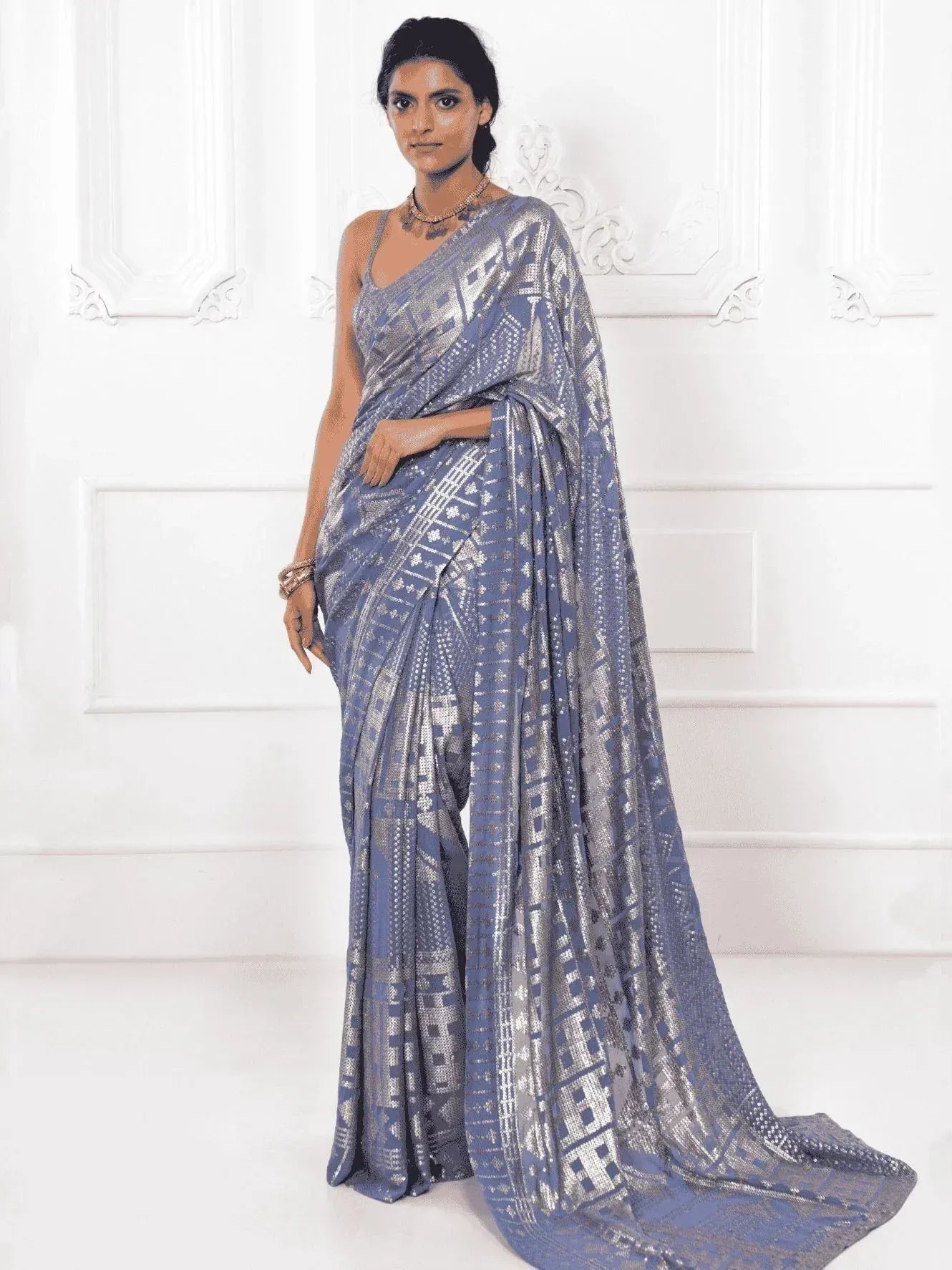 Blue and silver printed saree with geometric pattern, elegant ethnic wear for women