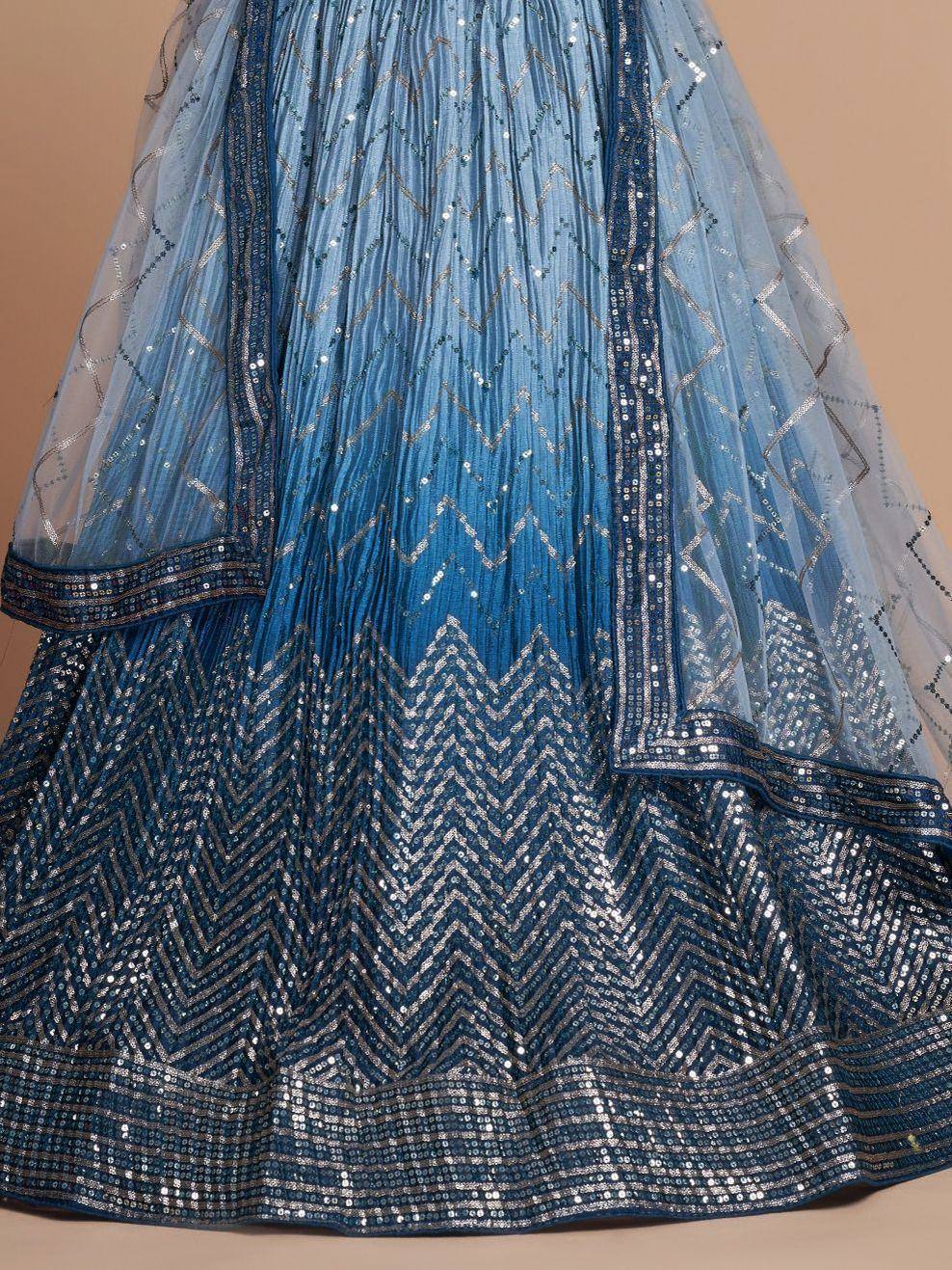Blue ombre lehenga with silver chevron sequin embroidery and sheer dupatta
