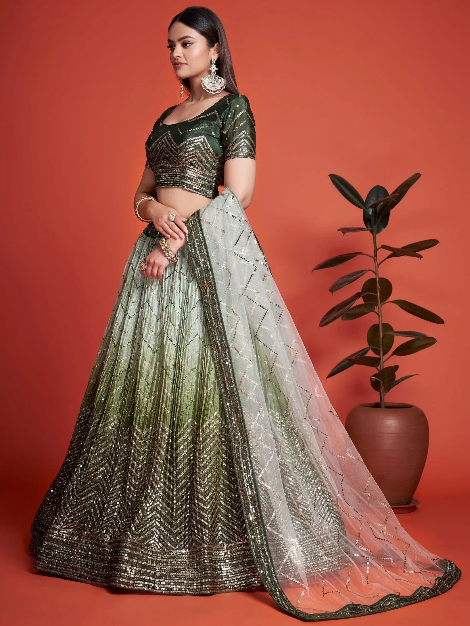 Green ombre lehenga choli with sequin work, perfect for Indian ethnic wear and festive occasions.