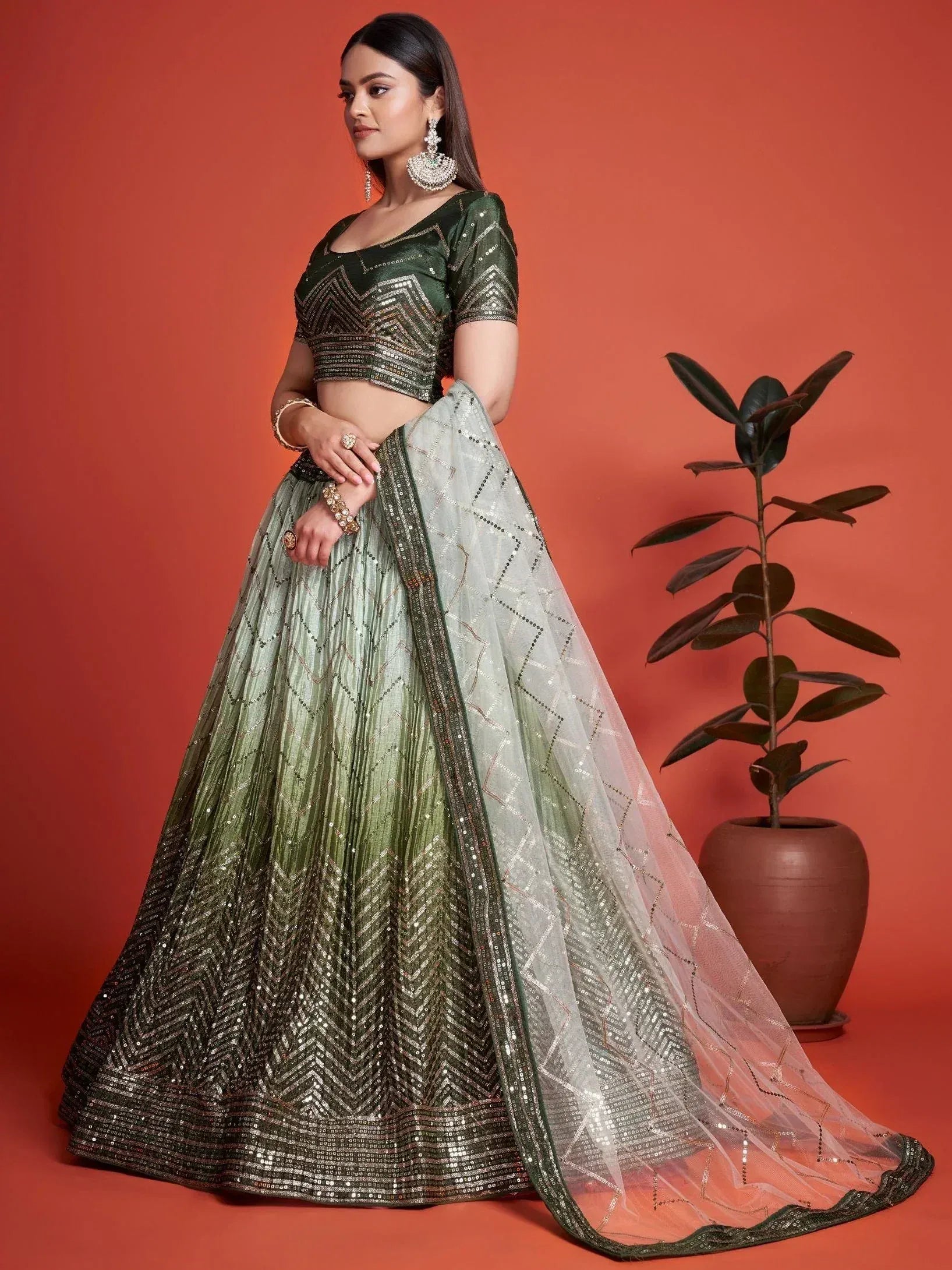 Green ombre lehenga choli with sequin work, perfect for Indian ethnic wear and festive occasions.