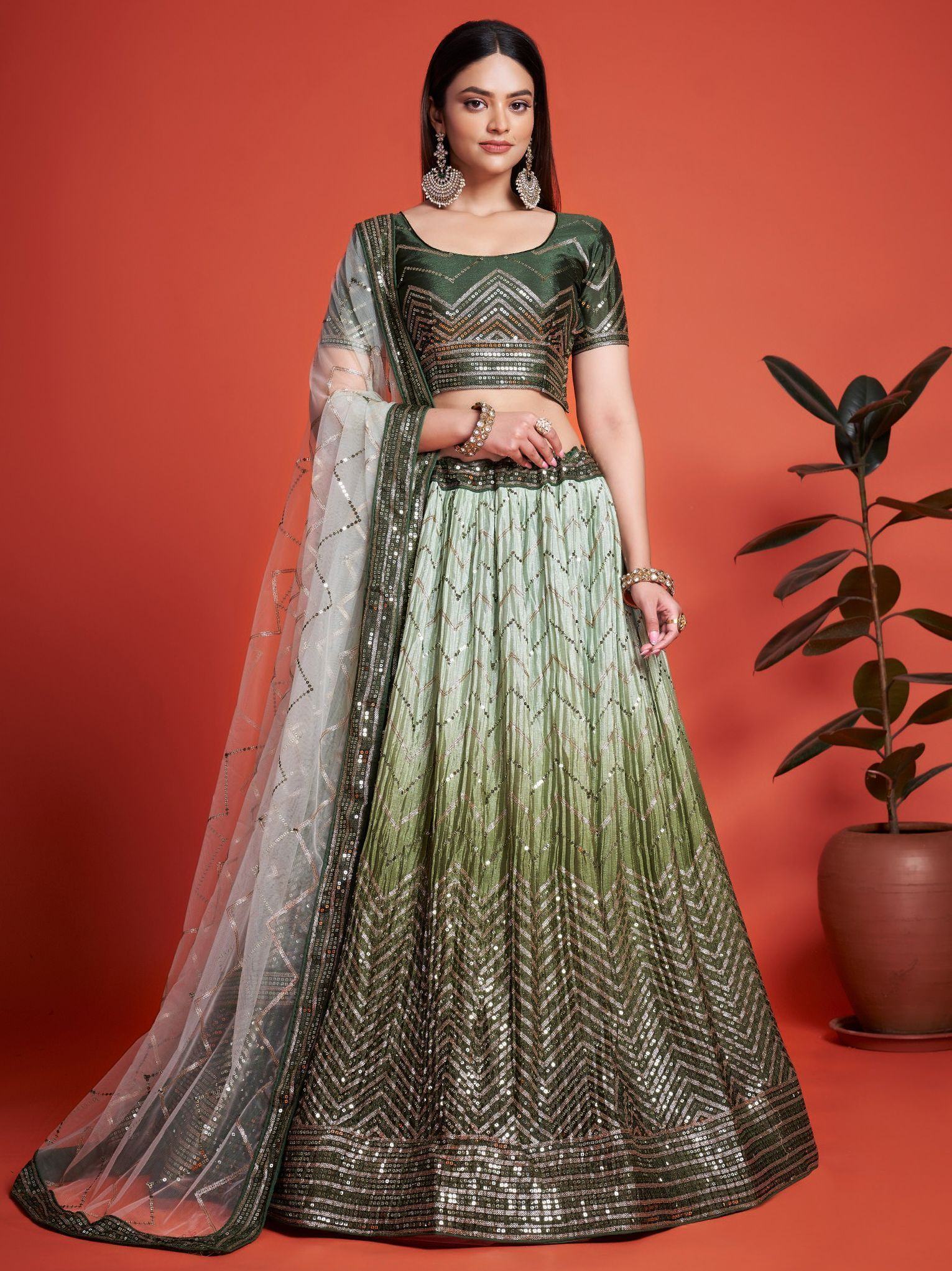 Green sequin lehenga choli with chevron pattern, sheer dupatta, Indian ethnic wear for weddings