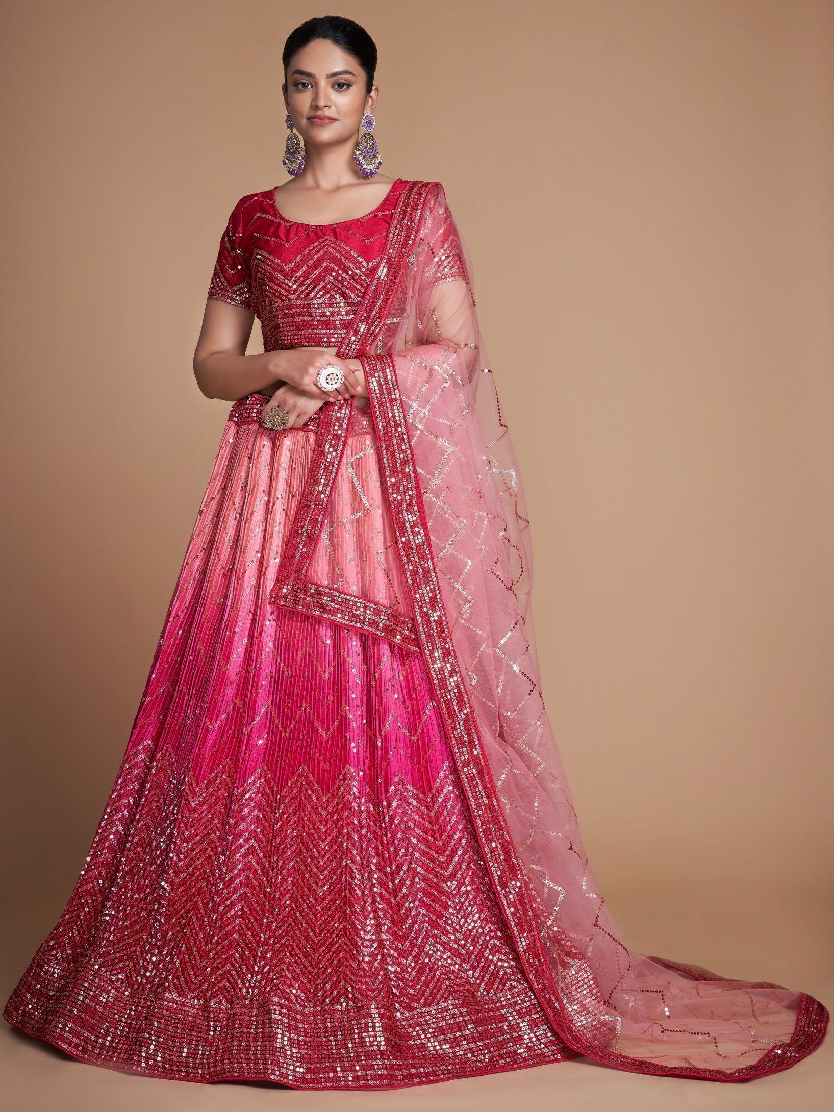 Pink and red sequined lehenga choli with sheer dupatta, ethnic Indian wear for weddings and festivals