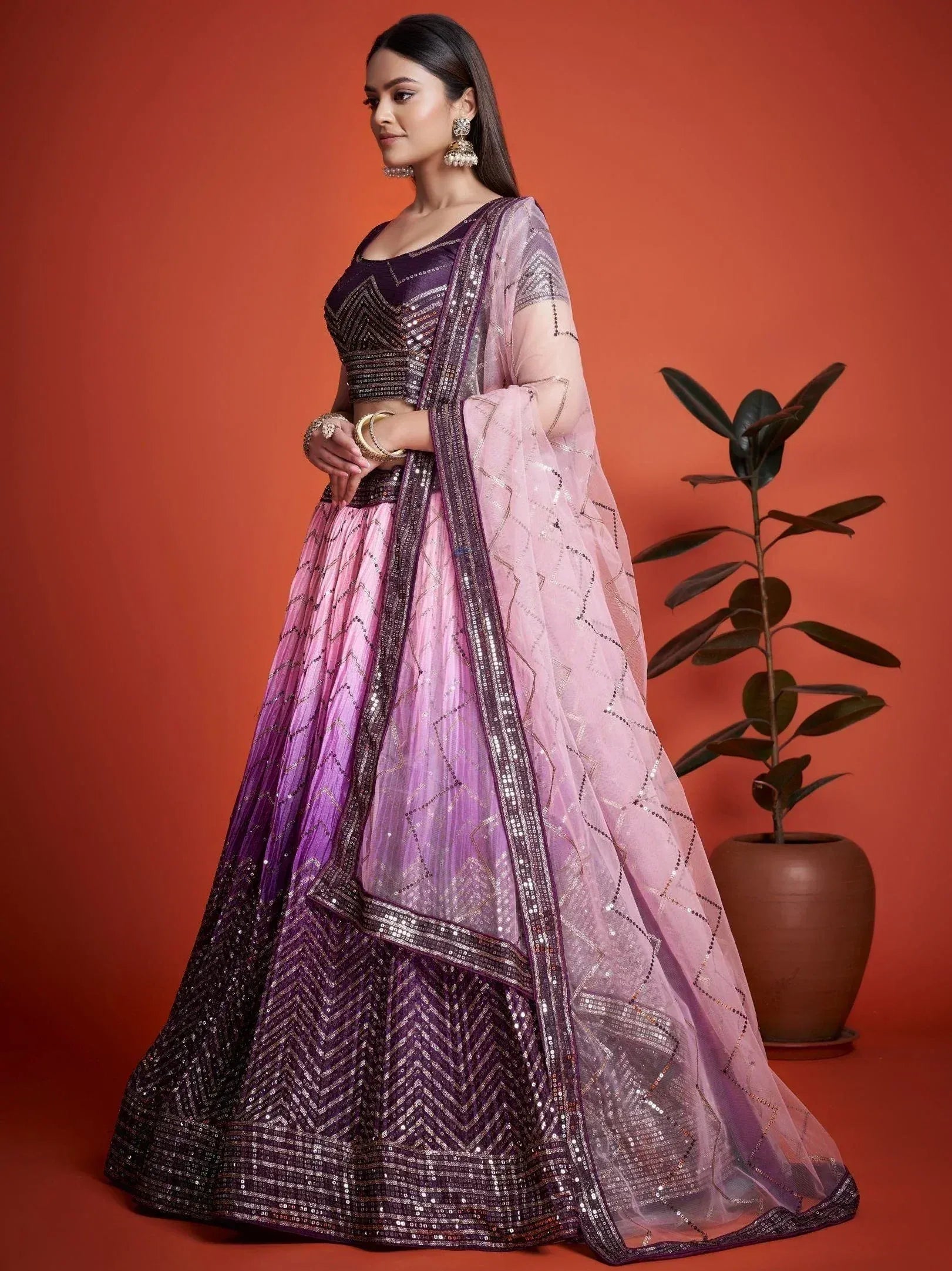 Purple and pink ombre lehenga choli with sequin embroidery, perfect for Indian weddings and festive occasions.