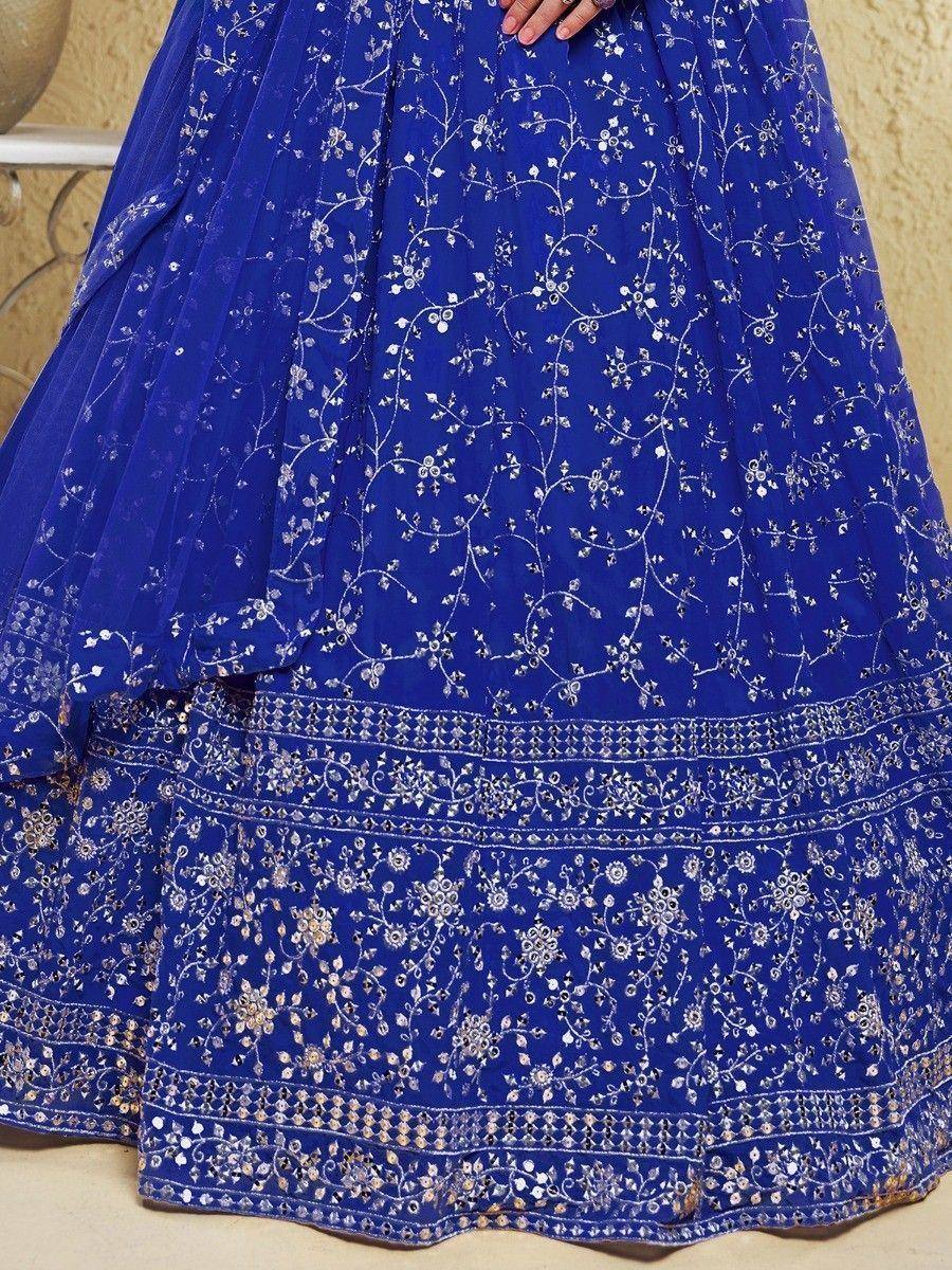Royal blue embroidered lehenga skirt with silver floral motifs and detailed border work
