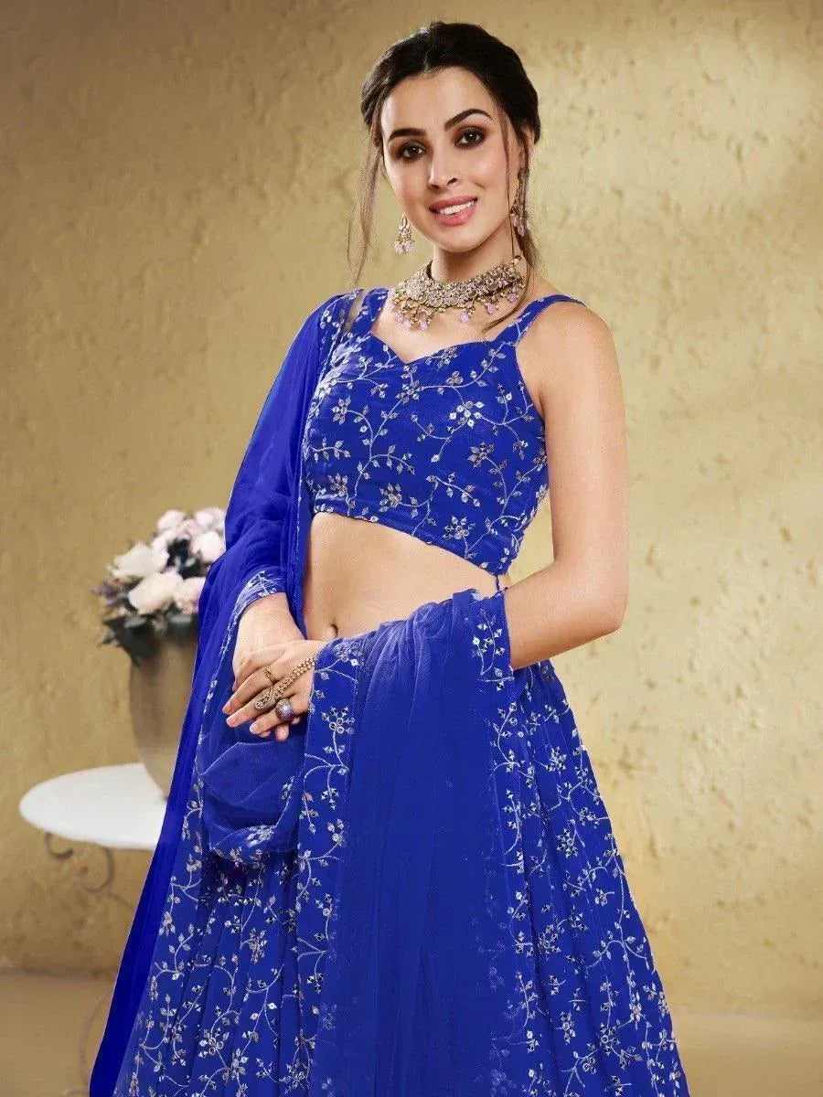 Royal blue embroidered lehenga choli with floral thread work, perfect for Indian ethnic wear occasions