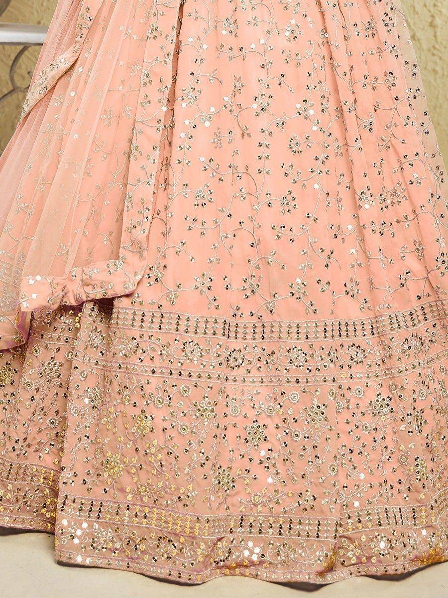 Pink embroidered lehenga with gold and silver floral sequin work, perfect for Indian weddings and festive occasions.