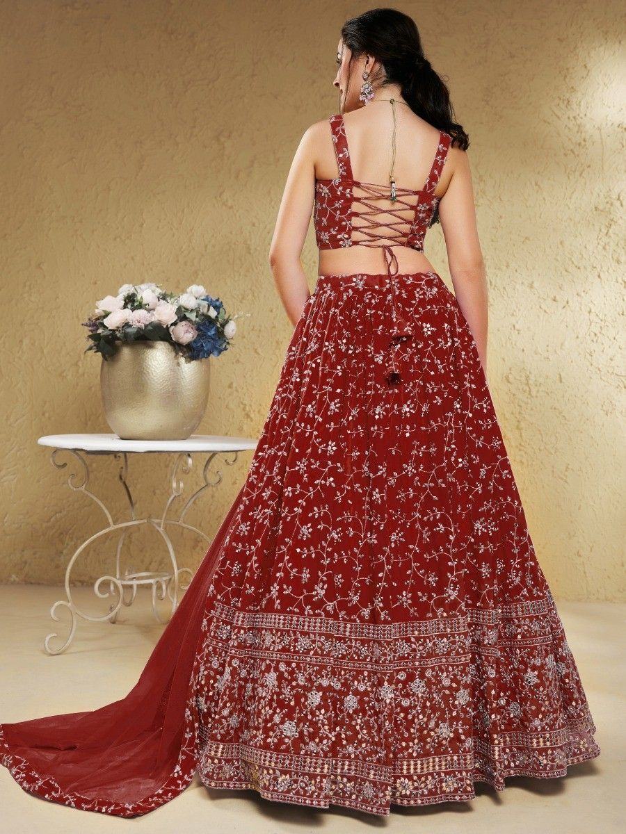 Red floral embroidered lehenga choli with lace-up back, perfect for Indian weddings and festive occasions