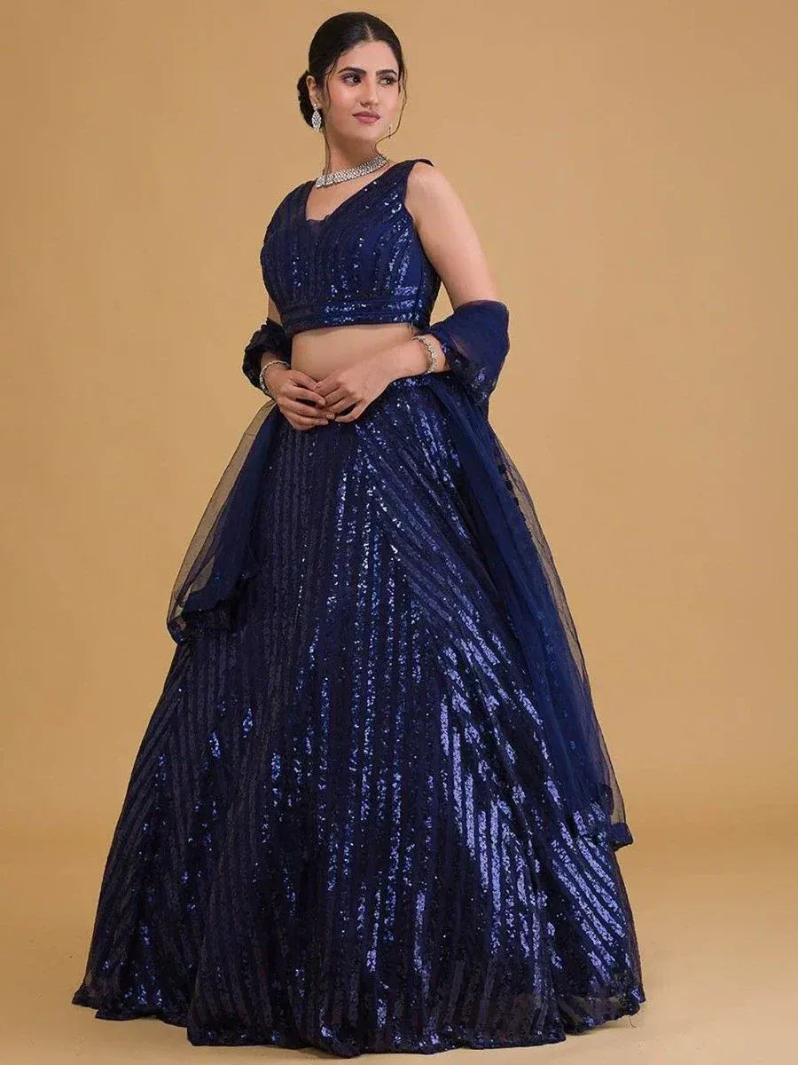 Navy blue sequin lehenga choli with sheer dupatta, elegant Indian ethnic wear for weddings and parties