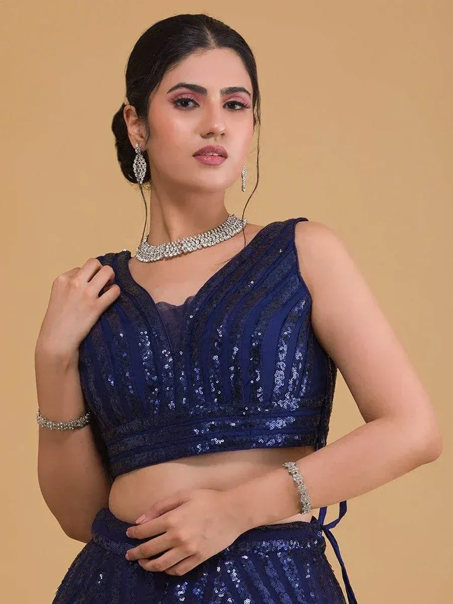 Navy blue sequin lehenga choli with V-neck blouse, perfect for Indian ethnic wear events