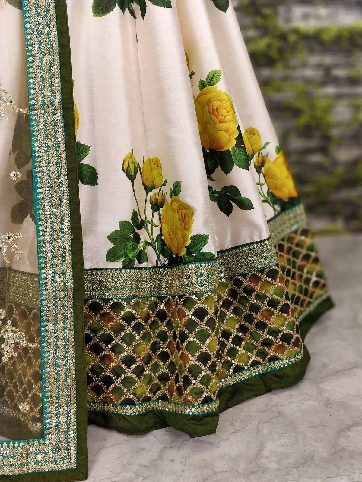 Cream lehenga with yellow rose print, green gold border, sequin embroidery, ethnic Indian wear