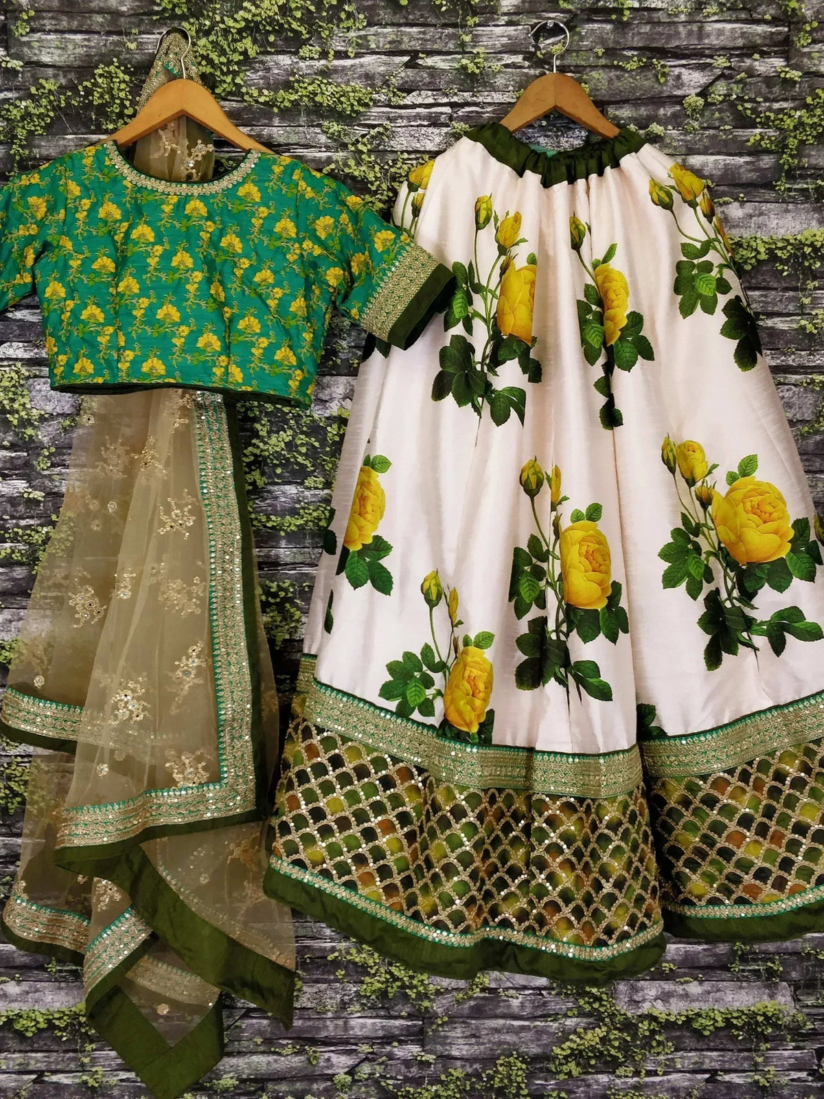Green and white floral lehenga choli with yellow rose print and sequin border, ethnic Indian wear