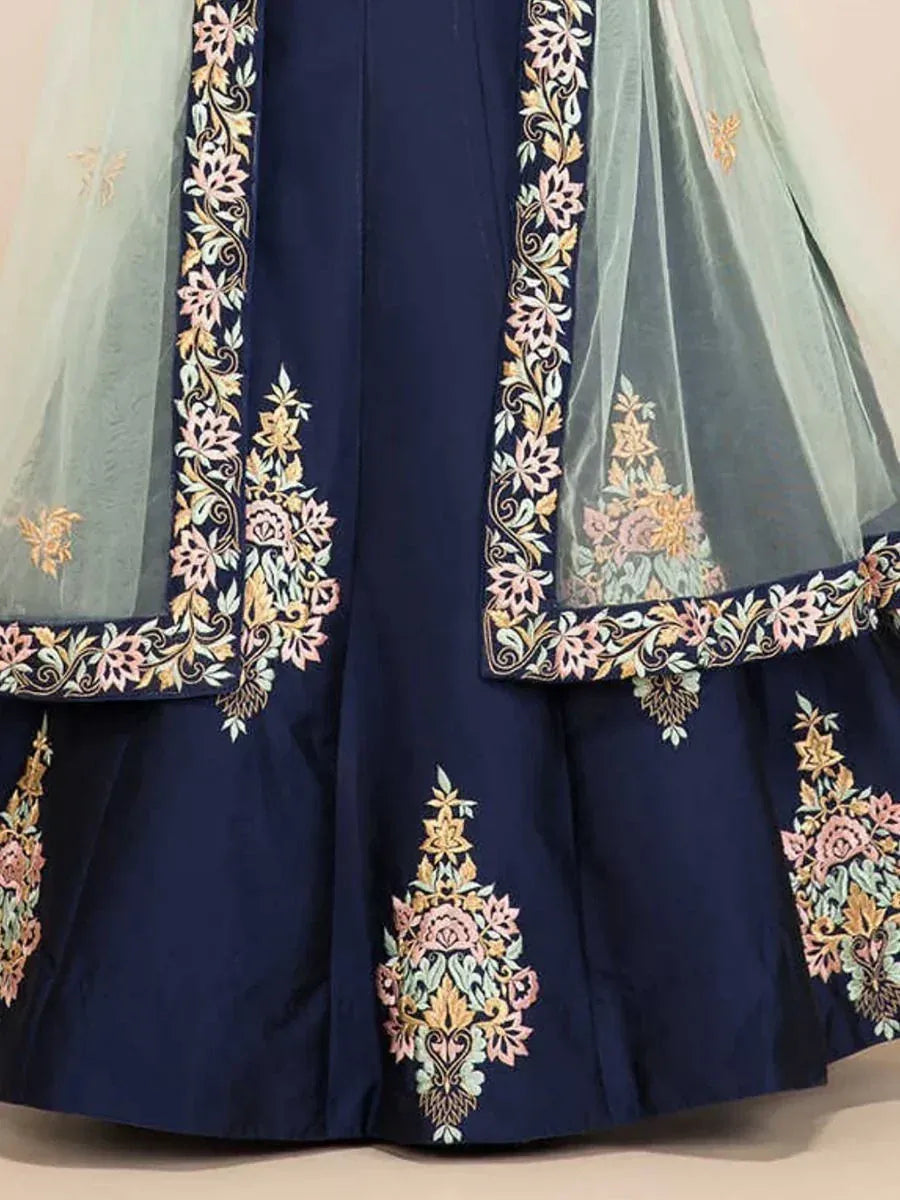 Navy blue lehenga with pastel floral embroidery and sheer dupatta, ethnic Indian wear