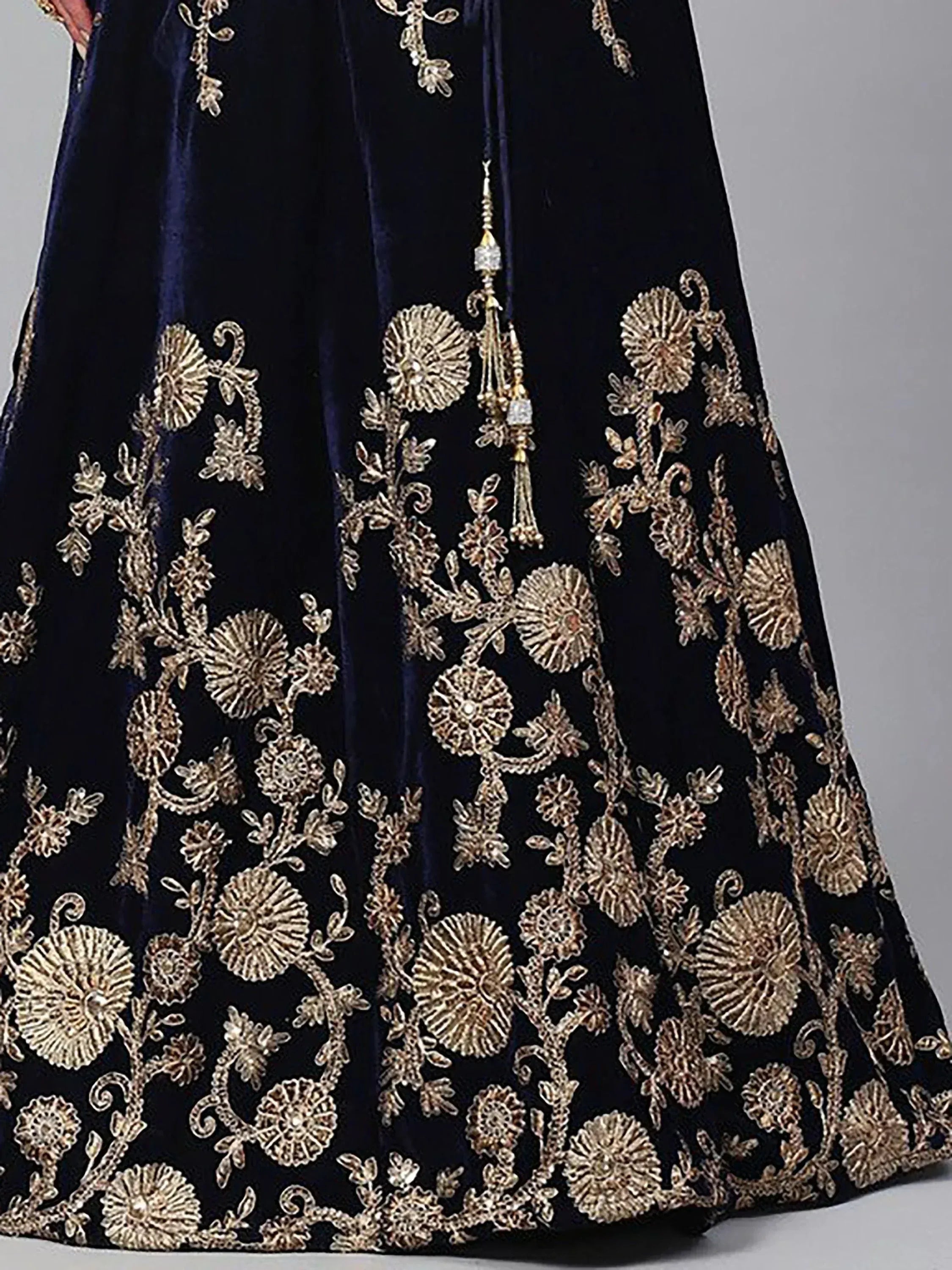 Navy blue velvet lehenga with gold floral embroidery and tassels, Indian ethnic wear