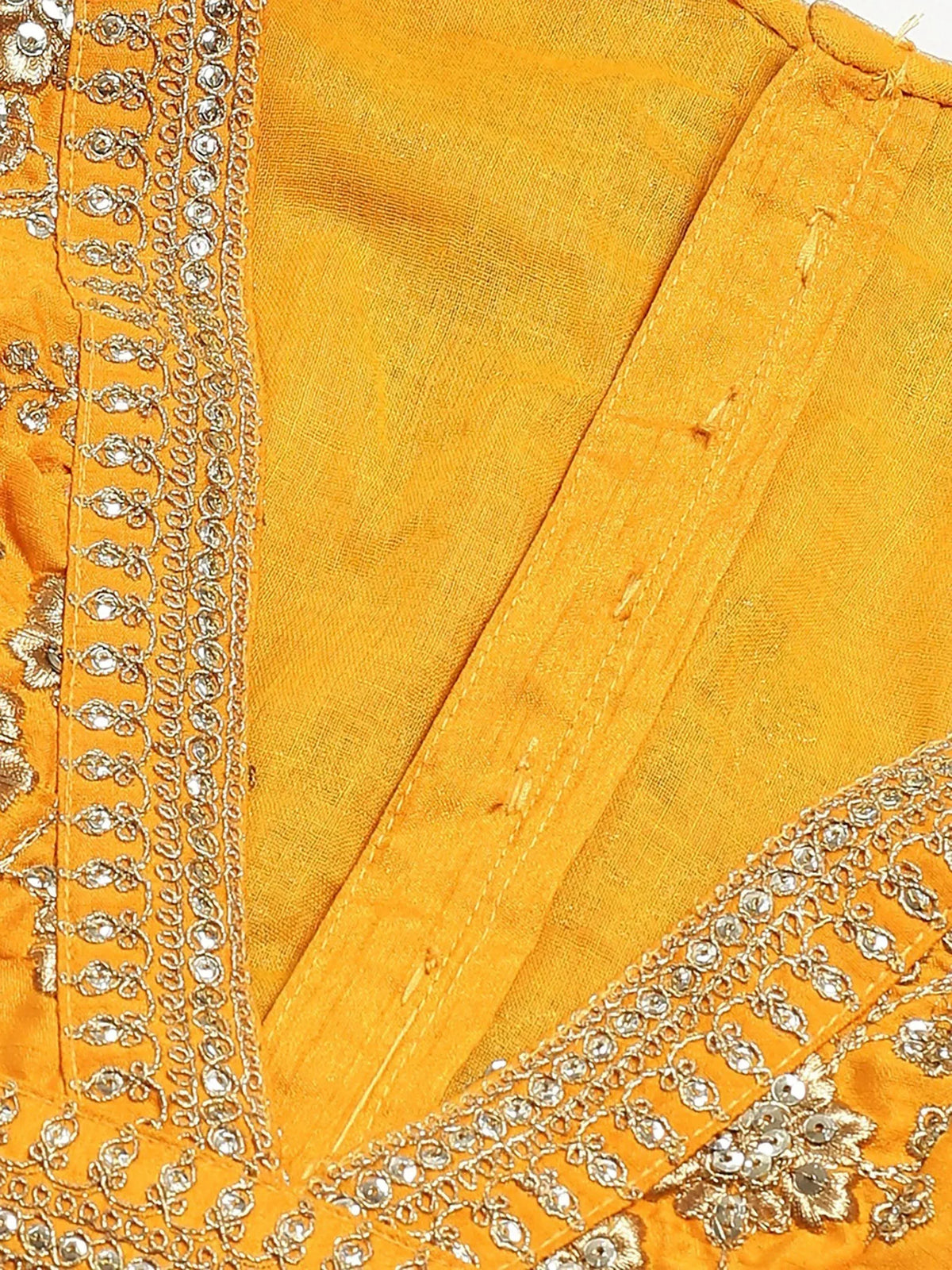 Mustard yellow ethnic wear with intricate silver embroidery and mirror work detail
