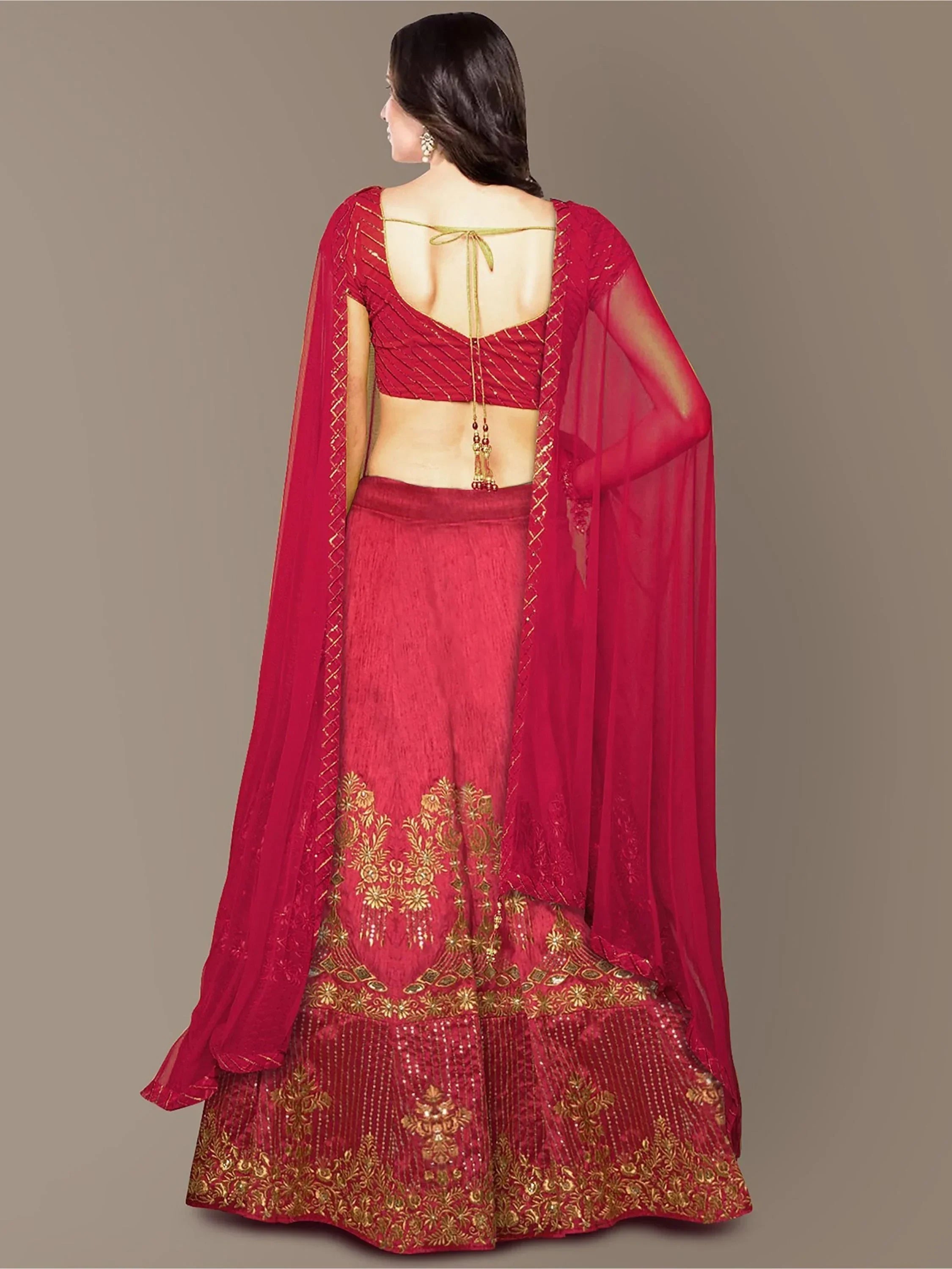 Red designer lehenga choli with gold embroidery and sheer dupatta, back view