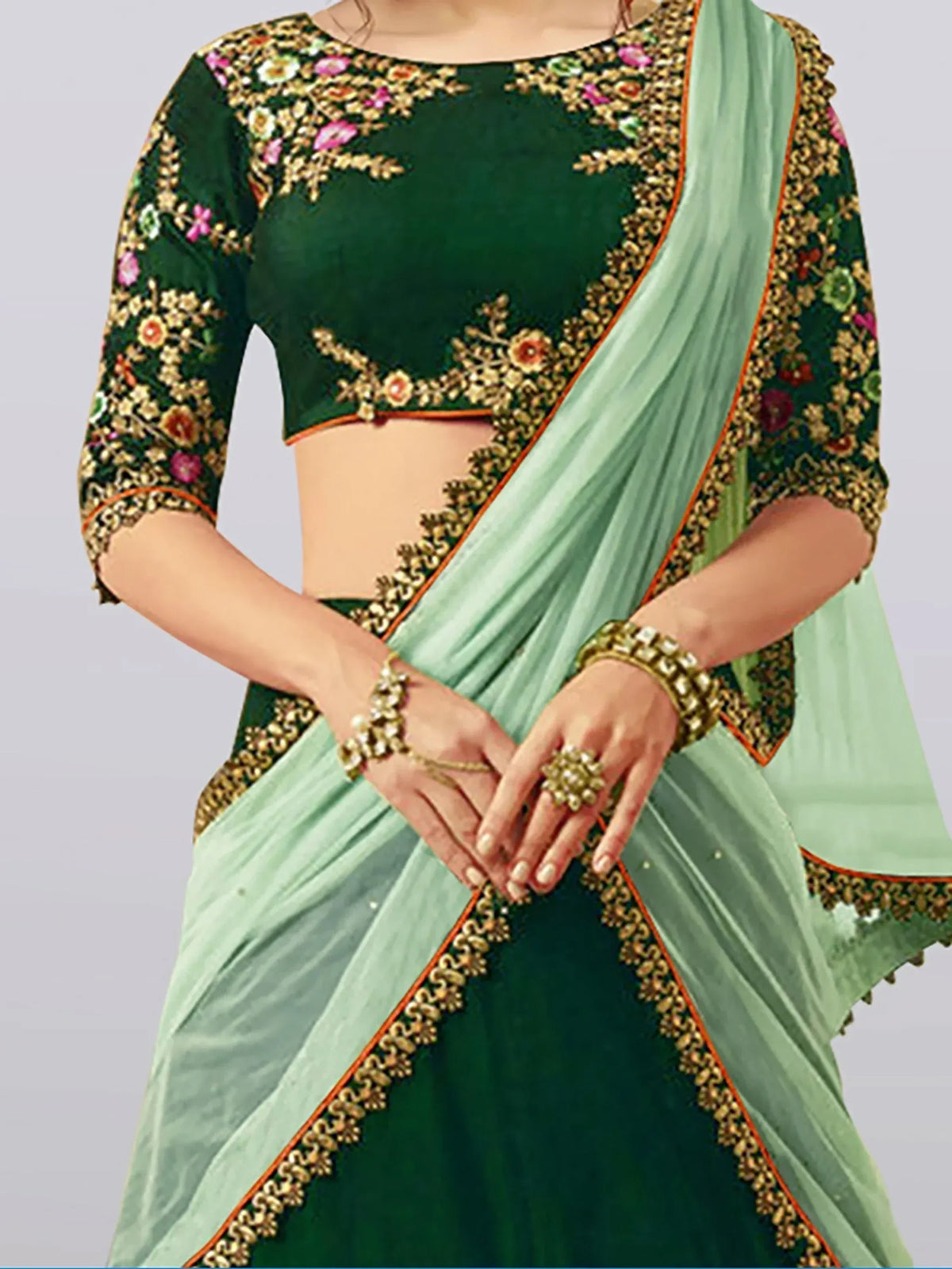 Green embroidered lehenga choli with mint dupatta, floral gold detailing, Indian ethnic wear
