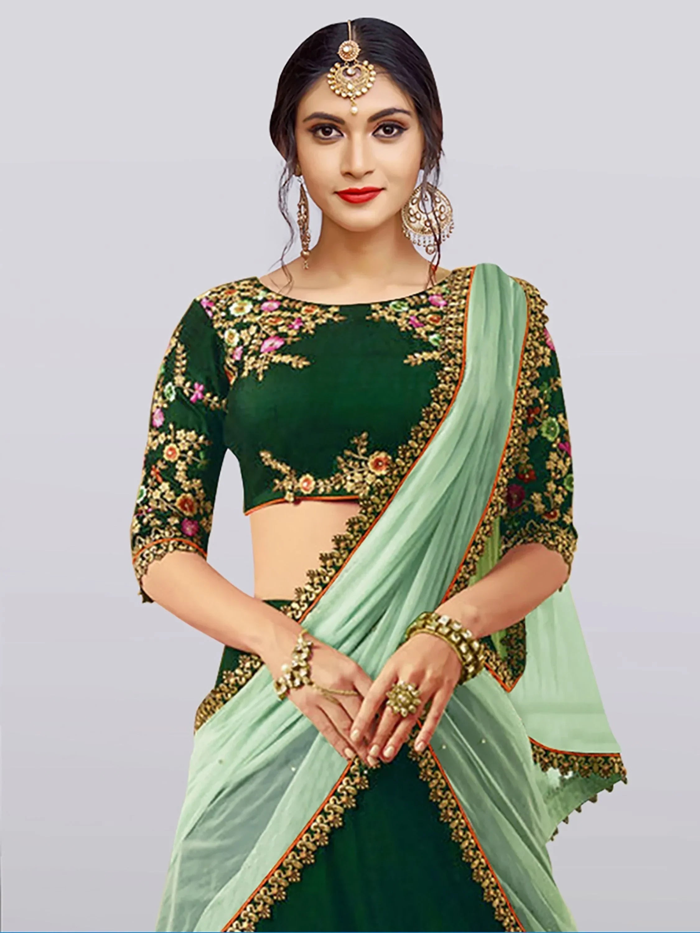 Green embroidered saree with floral blouse, perfect for Indian ethnic wear occasions