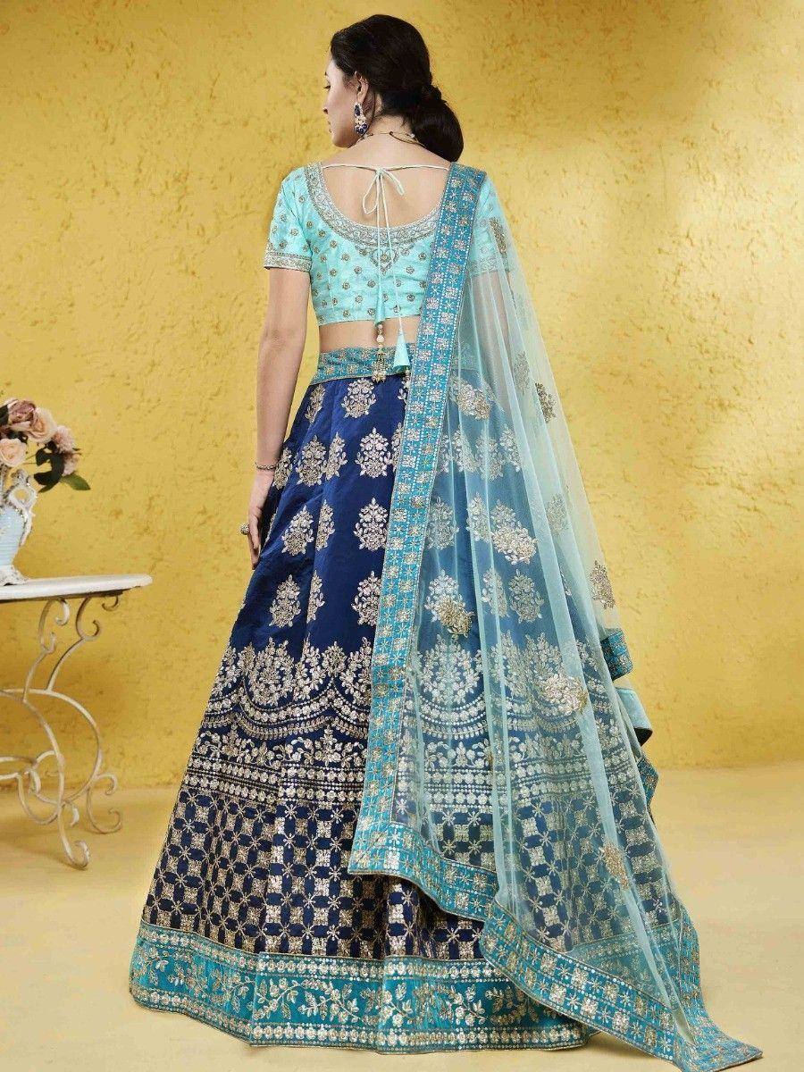 Blue and turquoise embroidered lehenga choli with sheer dupatta, perfect for Indian ethnic wear occasions