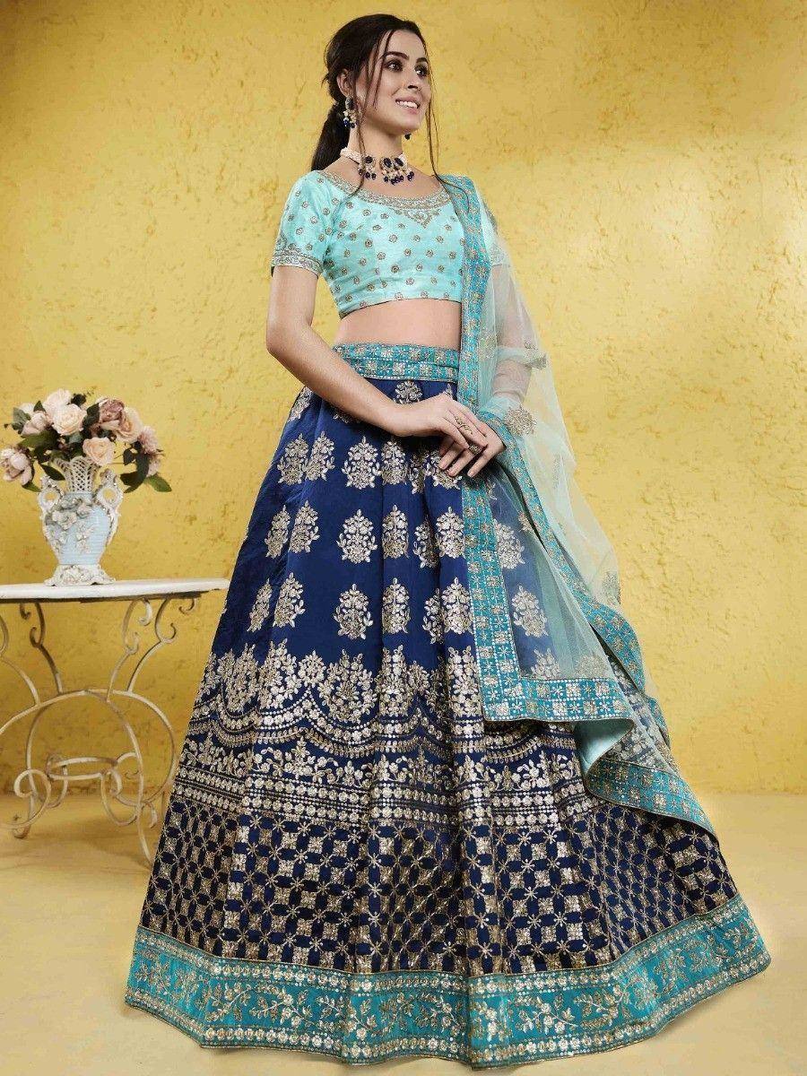 Blue and turquoise designer lehenga choli with gold embroidery, perfect for Indian ethnic wear occasions