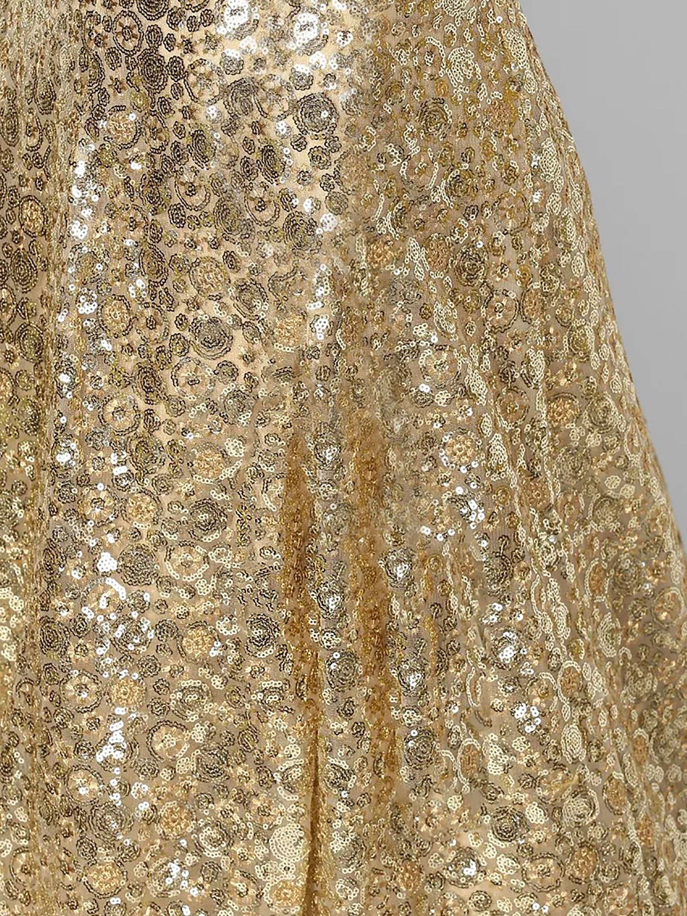 Gold sequin ethnic gown with intricate floral embroidery for festive occasions