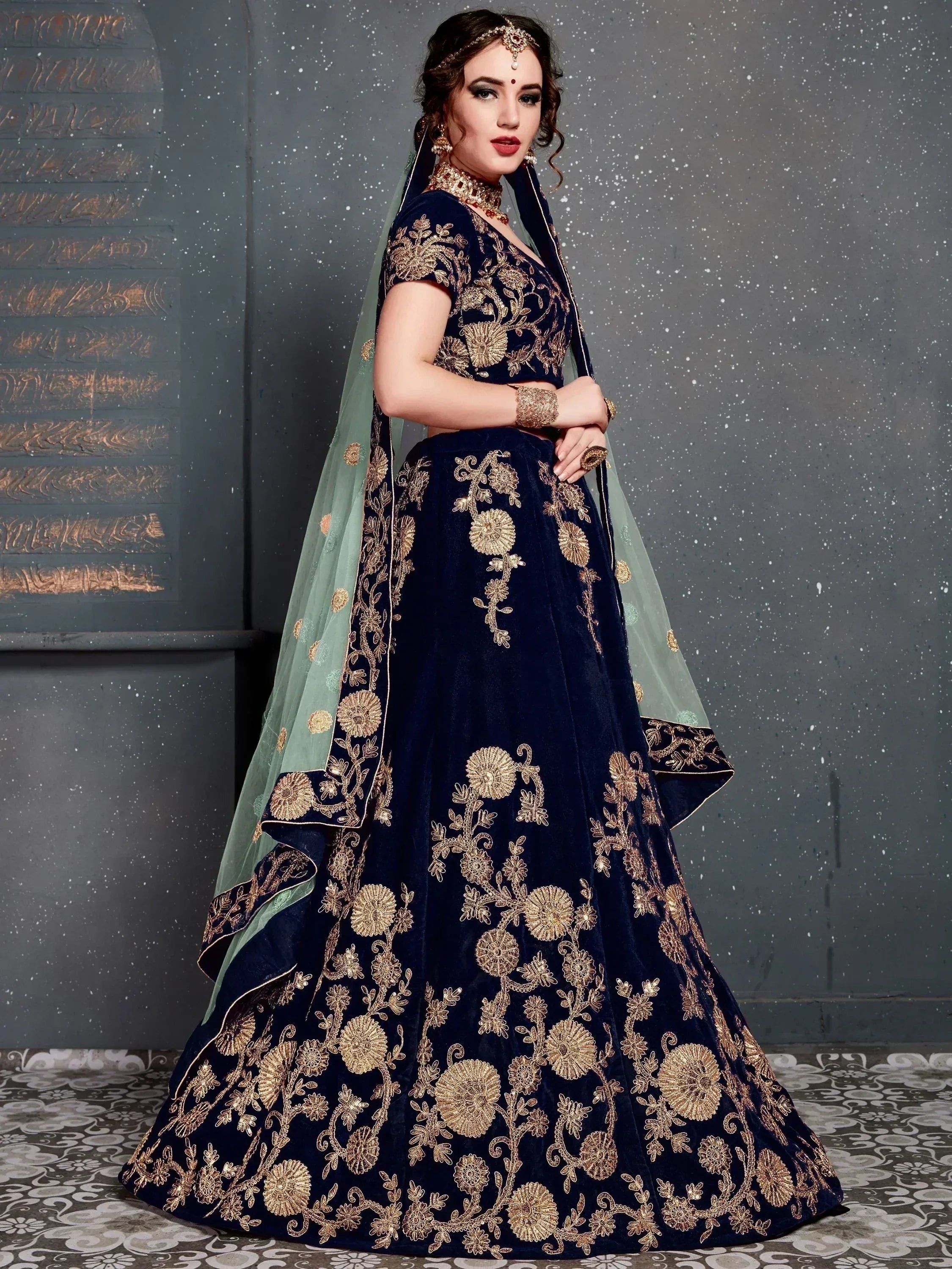 Navy blue velvet lehenga choli with gold floral embroidery and mint dupatta, Indian ethnic wear