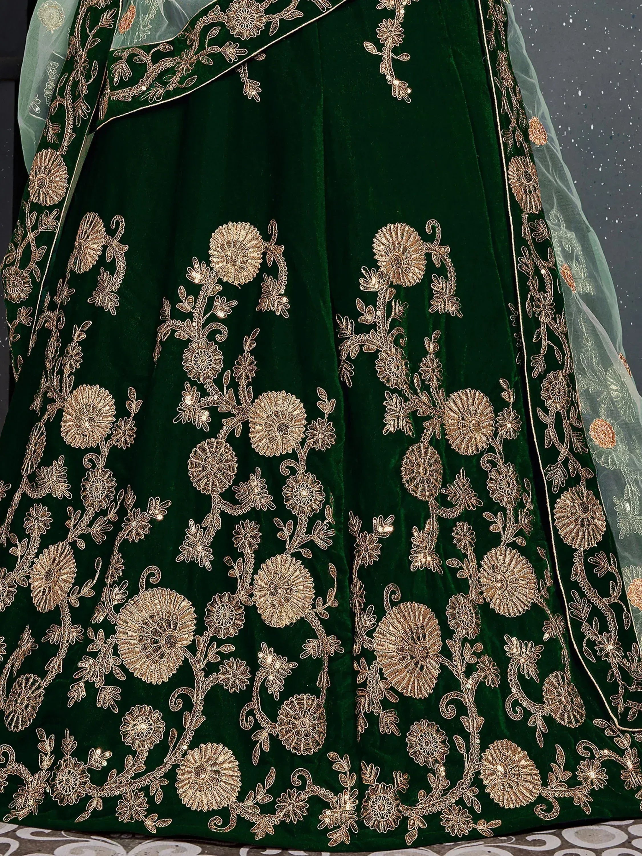 Emerald green velvet lehenga with gold floral embroidery and sheer dupatta, Indian ethnic wear