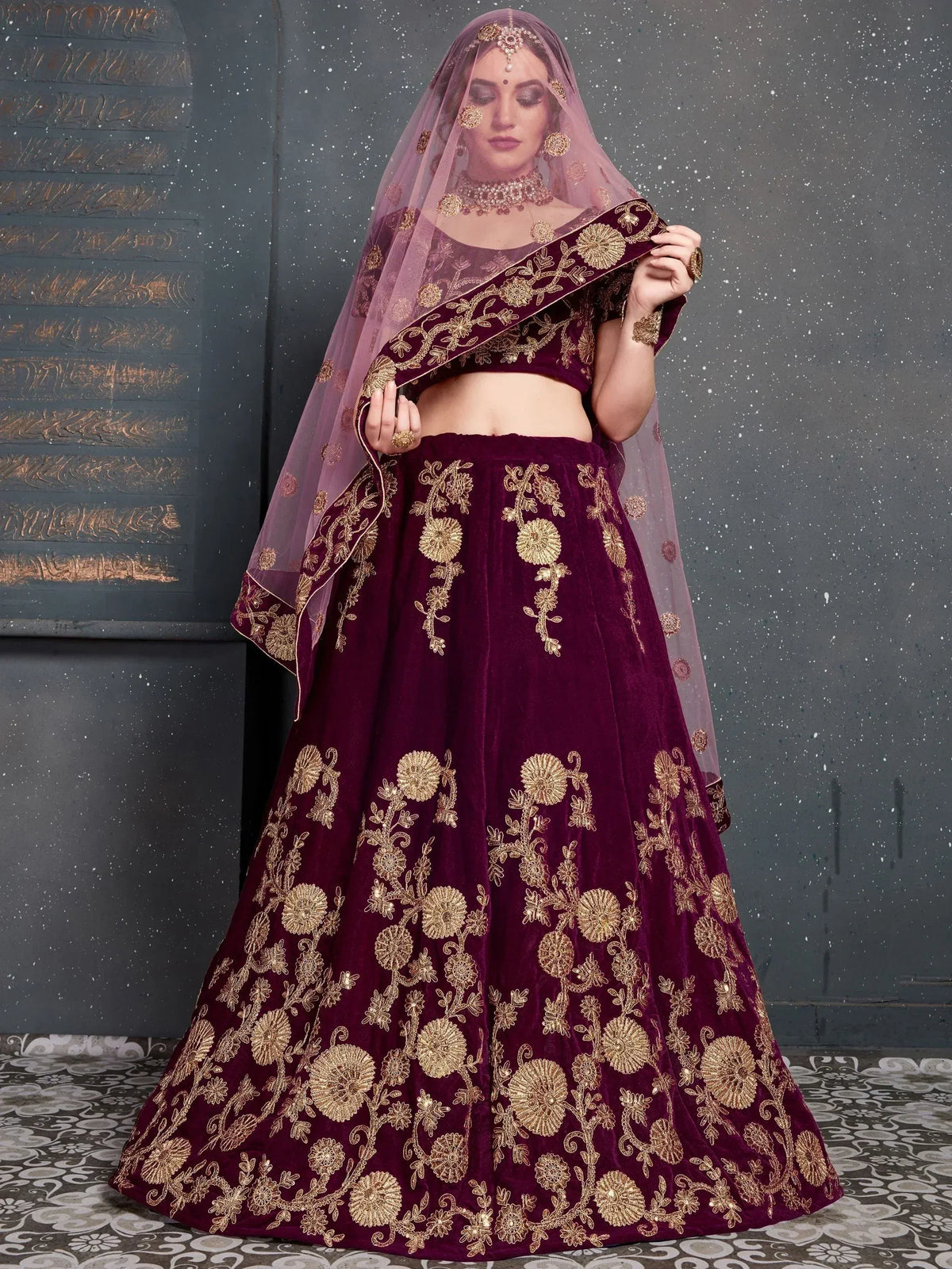 Burgundy velvet lehenga choli with gold floral embroidery and sheer dupatta, Indian ethnic wear