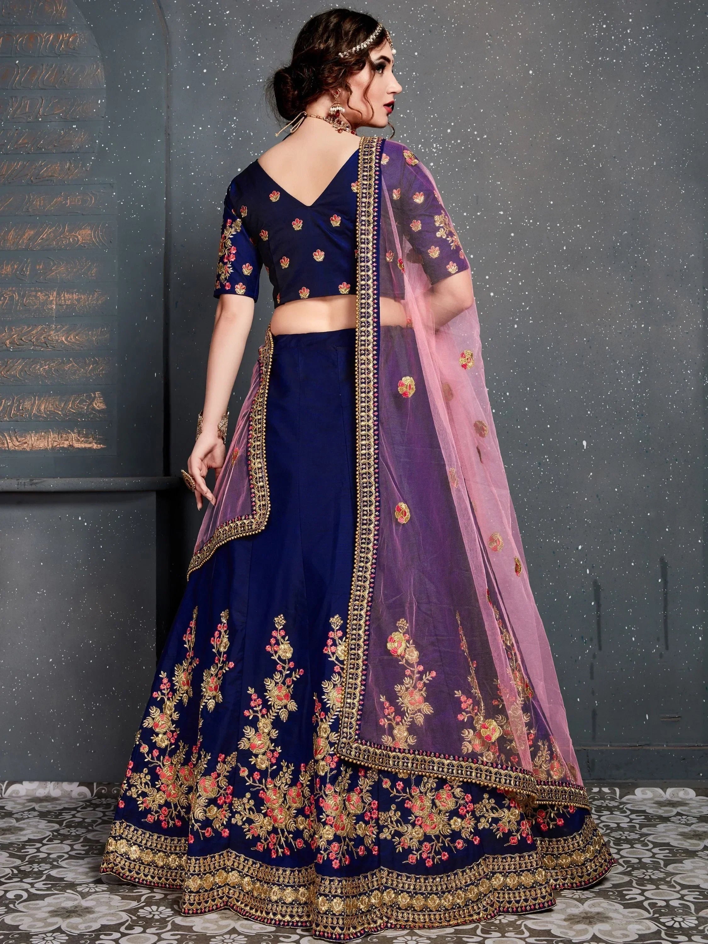 Navy blue embroidered lehenga choli with floral motifs and sheer ombre dupatta for Indian ethnic wear