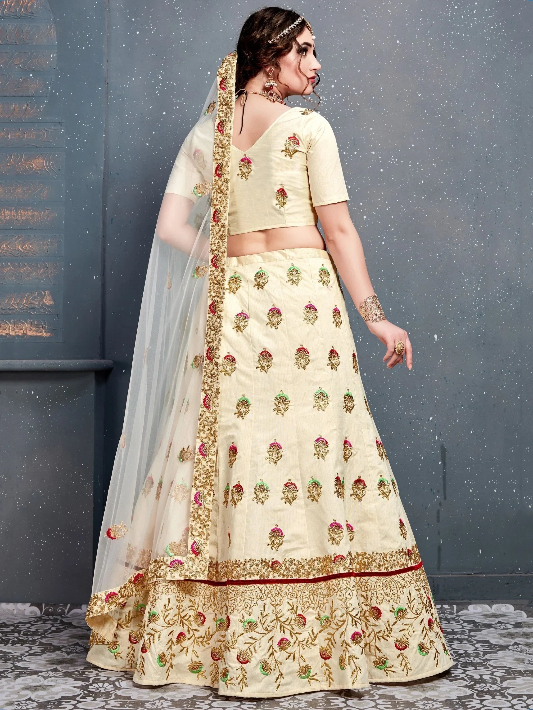 Cream embroidered lehenga choli with floral motifs and sheer dupatta, Indian ethnic wear