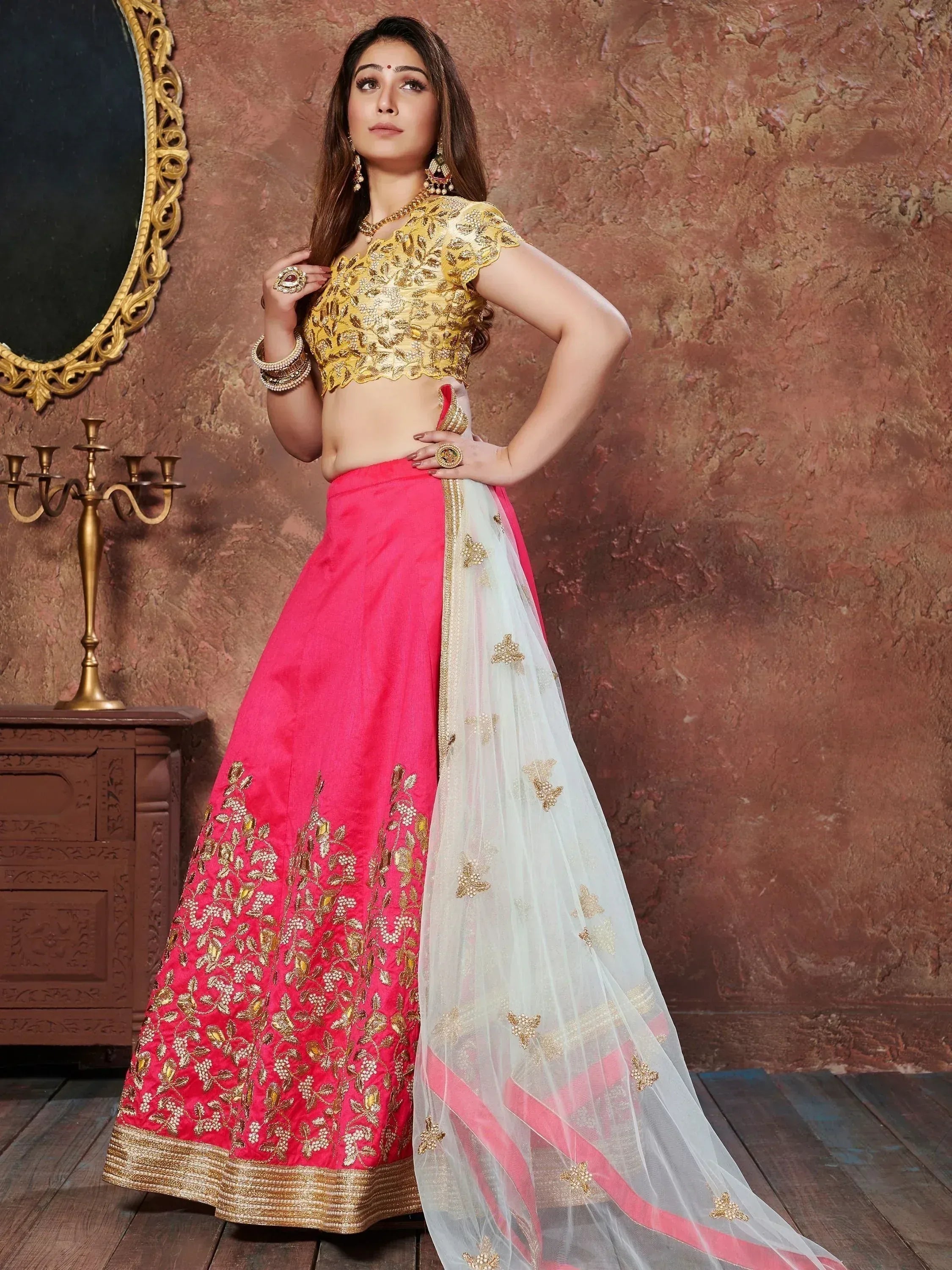 Pink and gold embroidered lehenga choli with sheer dupatta, Indian ethnic wear for weddings and festivals