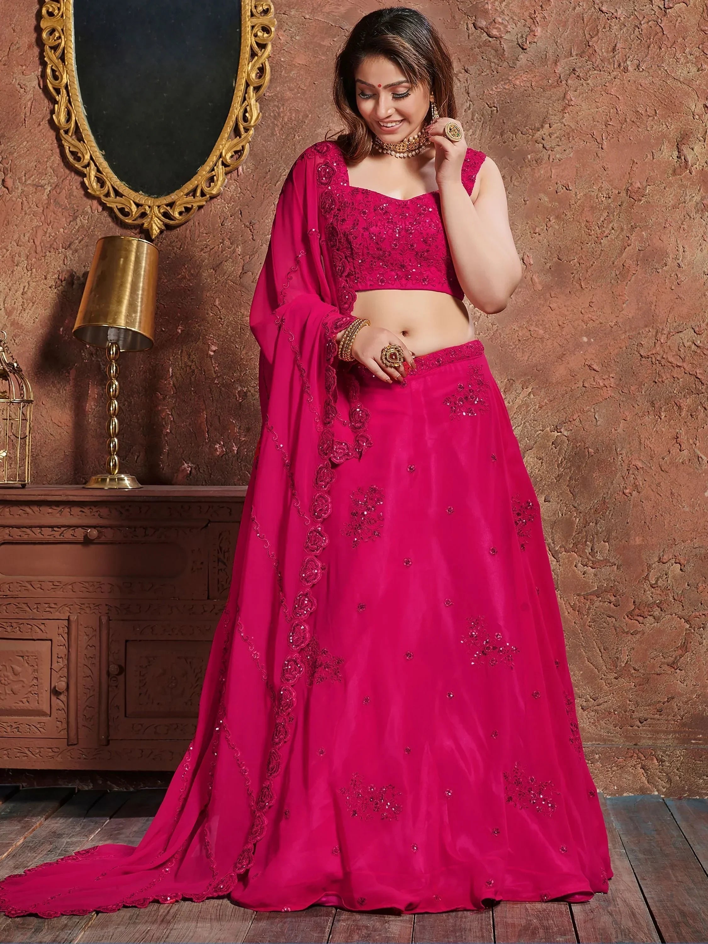 Fuchsia pink embroidered lehenga choli with sequin work, perfect for Indian ethnic occasions