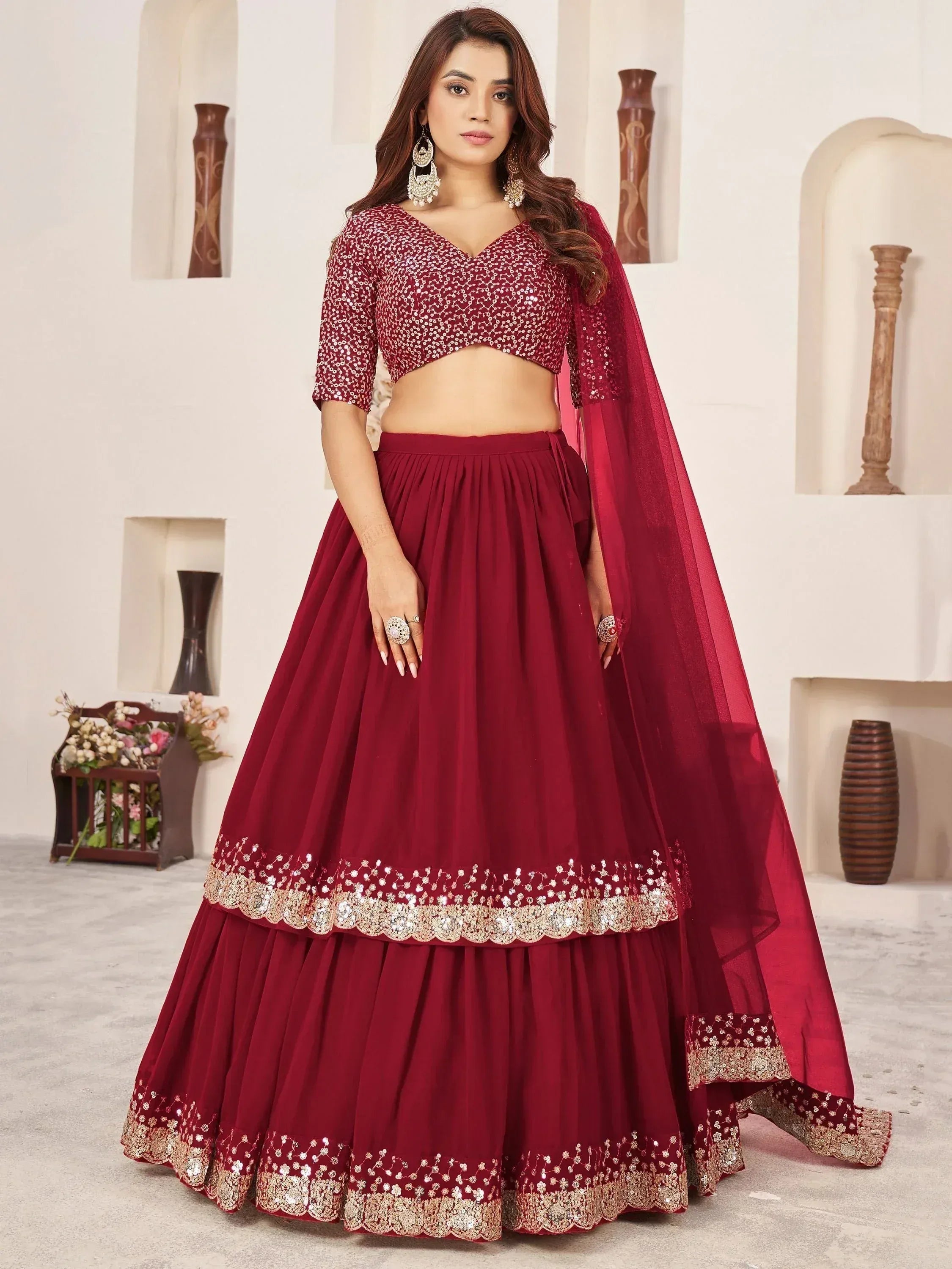 Maroon sequin lehenga choli with gold embroidery, perfect for Indian weddings and festive occasions