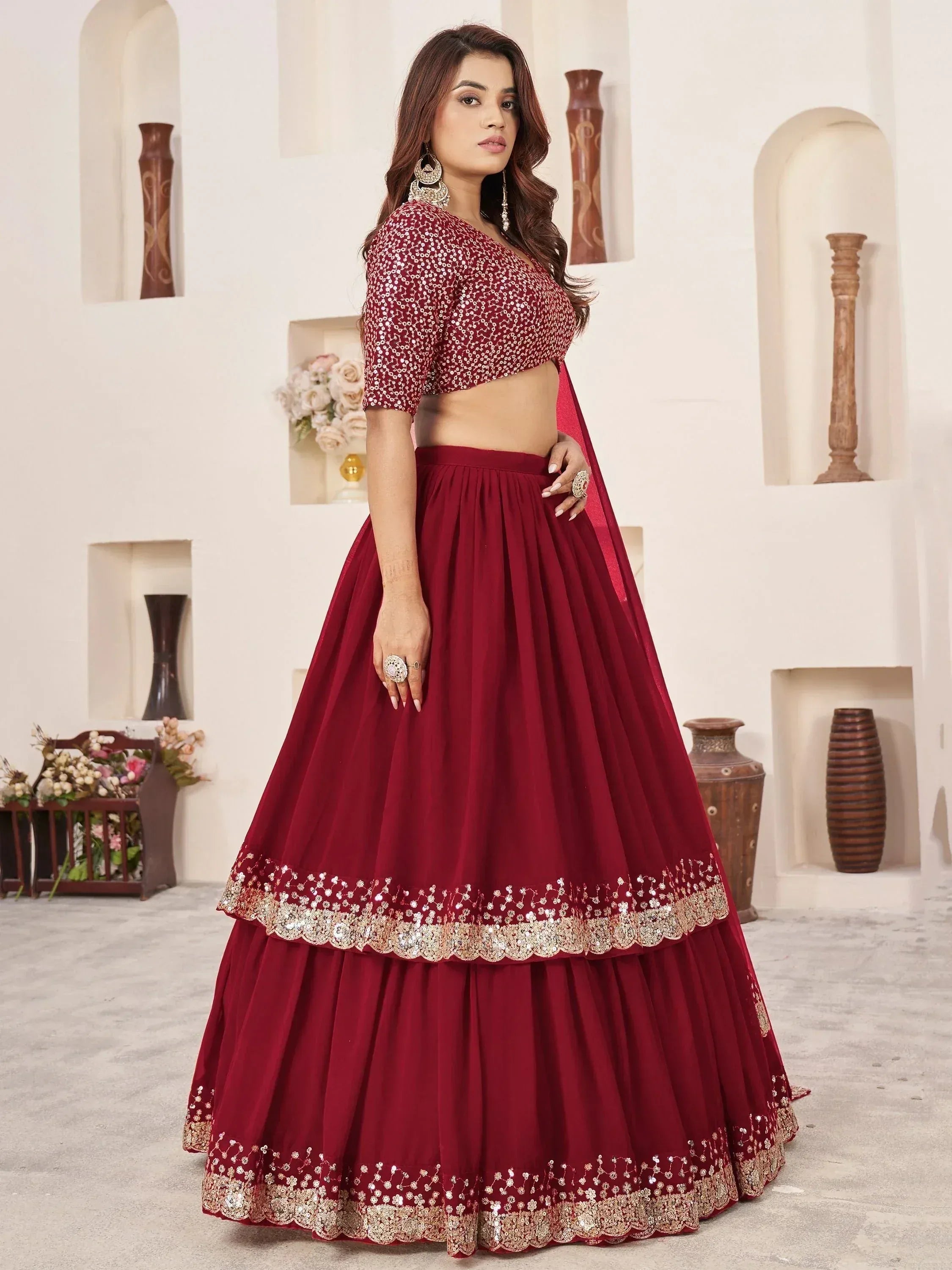 Maroon designer lehenga choli with sequin work, perfect for weddings and festive occasions