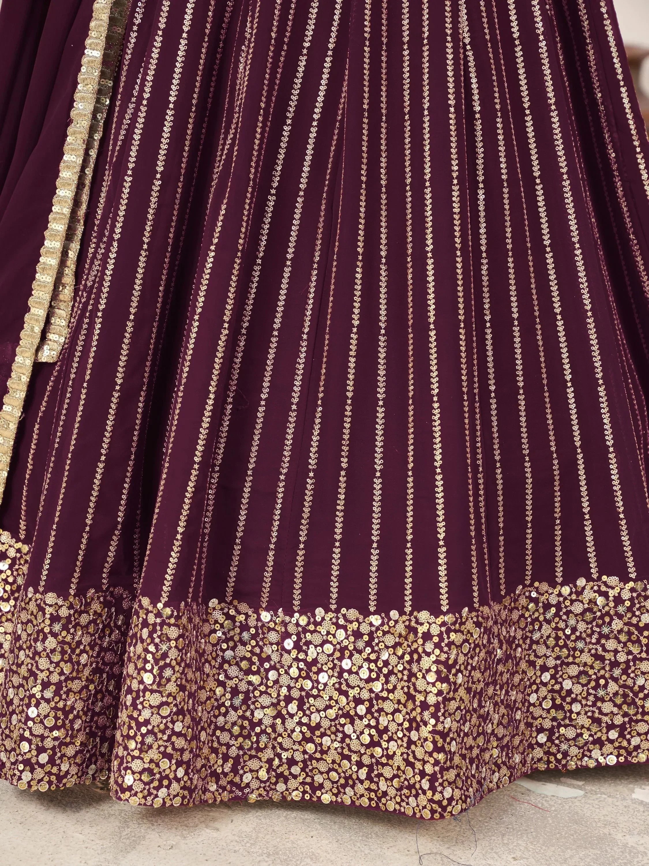 Purple lehenga with gold embroidery and sequin border, ethnic Indian wear
