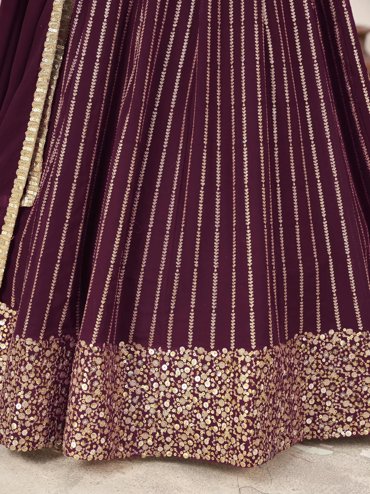 Purple lehenga with gold embroidery and sequin border, ethnic Indian wear