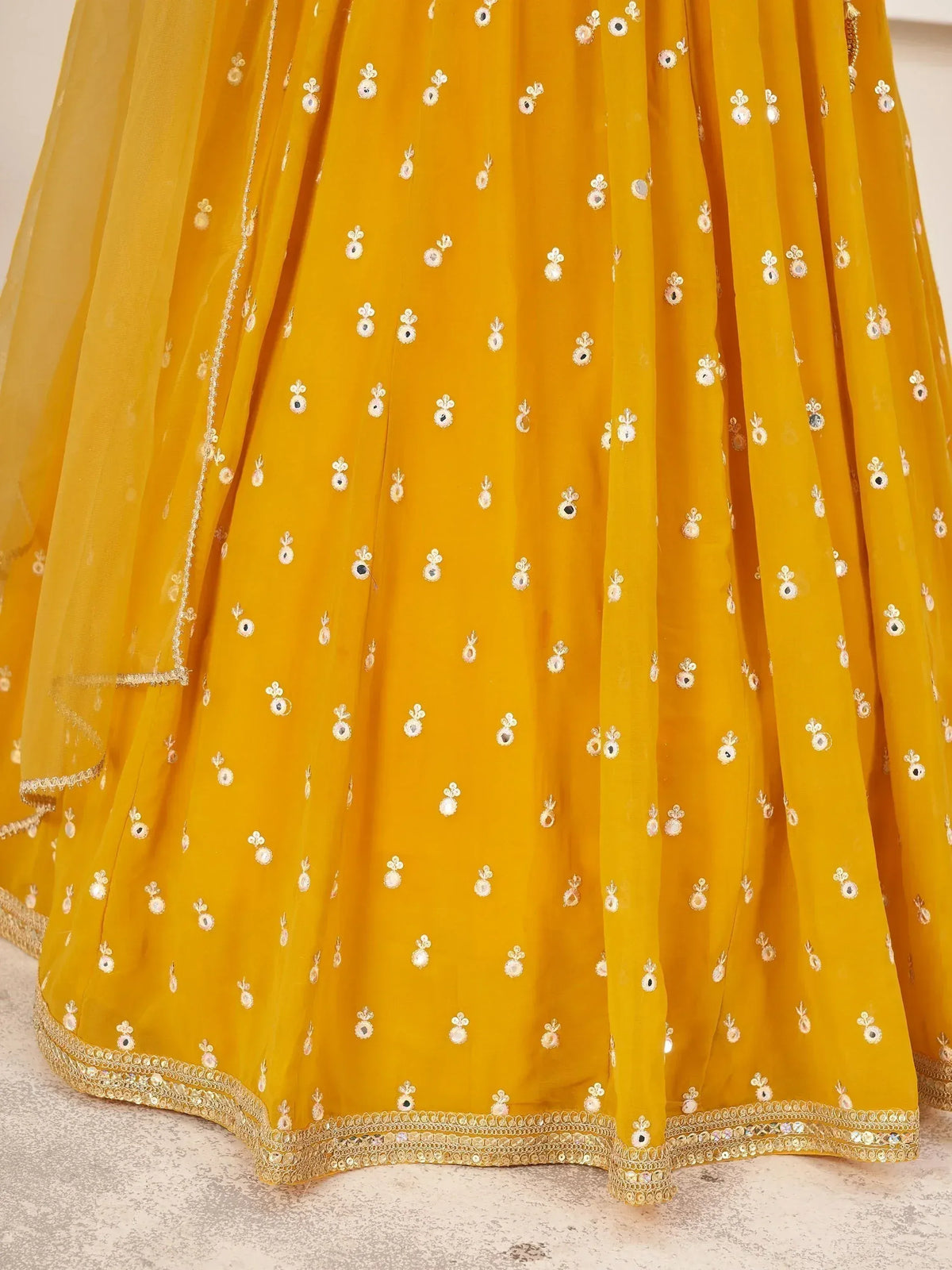 Mustard yellow lehenga with mirror and thread embroidery, ethnic Indian wear
