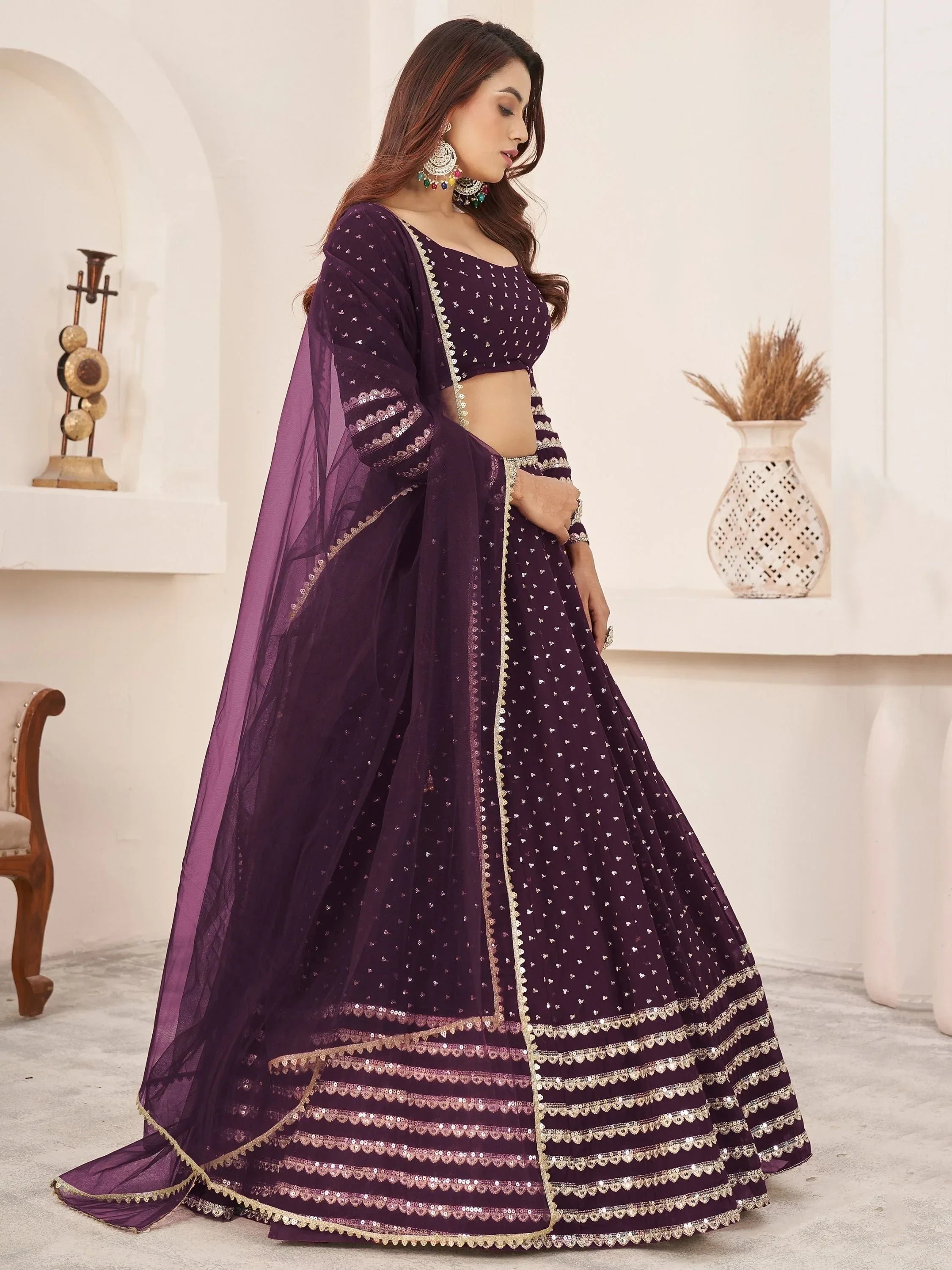 Purple designer lehenga choli with gold embroidery and sequin detailing for Indian ethnic wear