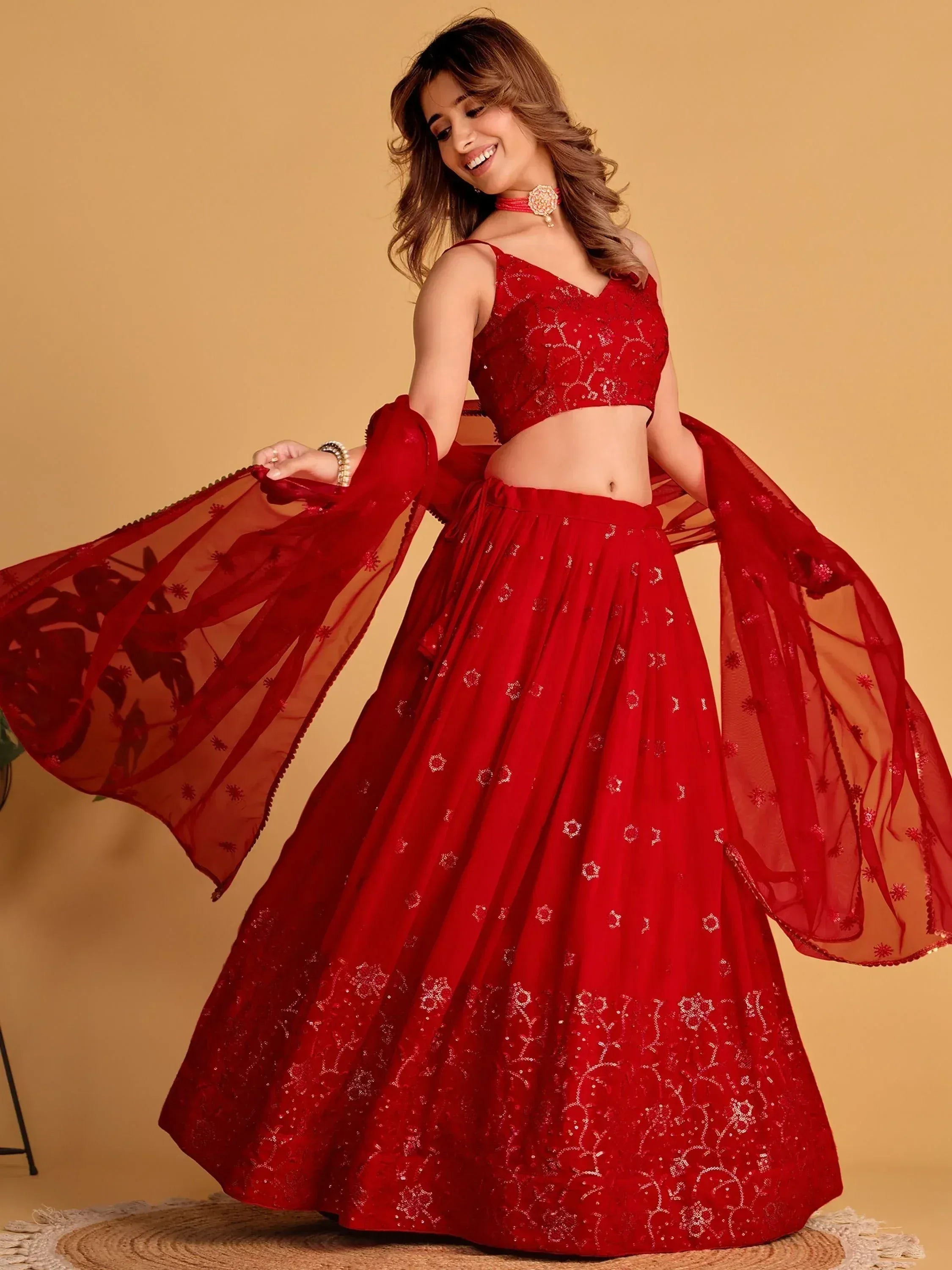 Red designer lehenga choli with sequin embroidery and sheer dupatta for Indian ethnic wear