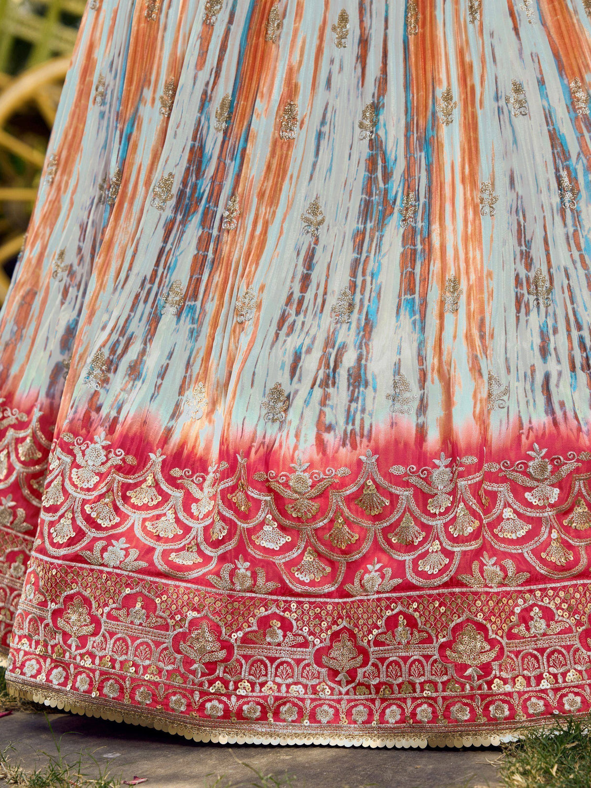 Designer lehenga with ombre print and gold embroidery, perfect for Indian ethnic wear
